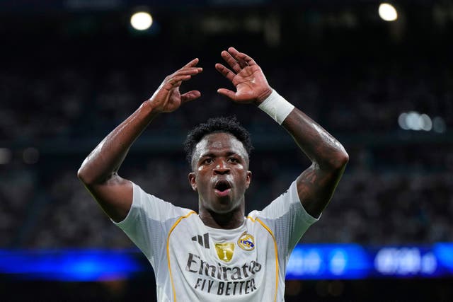 Real Madrid’s Vinicius Junior celebrates scoring his match-winner (Manu Fernandez/AP)