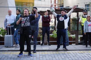 Protesters other than Britannia Hotel in Canary Wharf (Lucy North/PA)