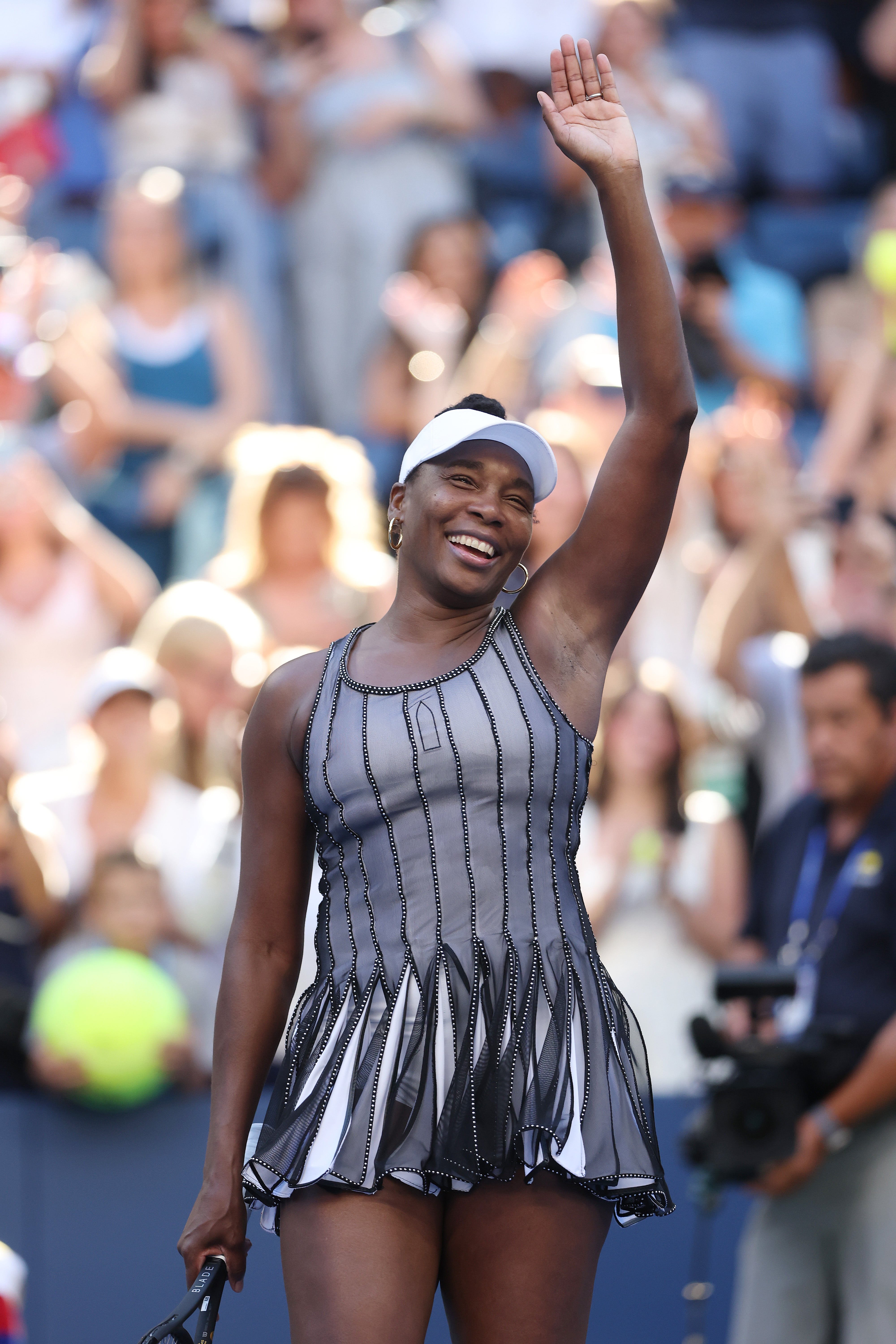 Williams' gray striped dress worn during her August 30 doubles match fell flat compared to her crisp white ensemble earlier in the tournament