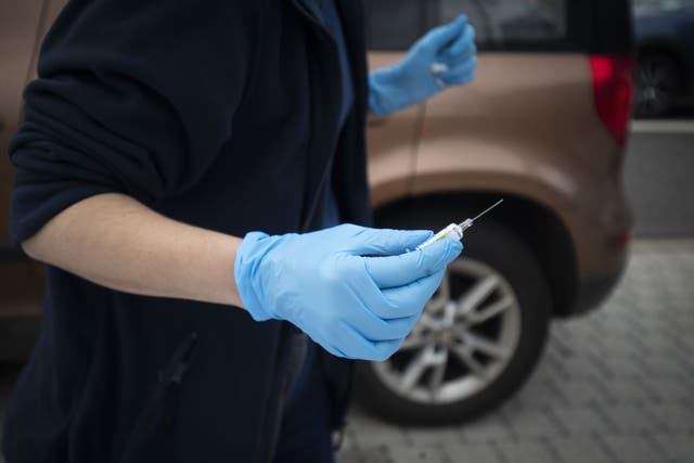 Children and pregnant women will start receiving flu vaccinations from Monday (Jane Barlow/PA)