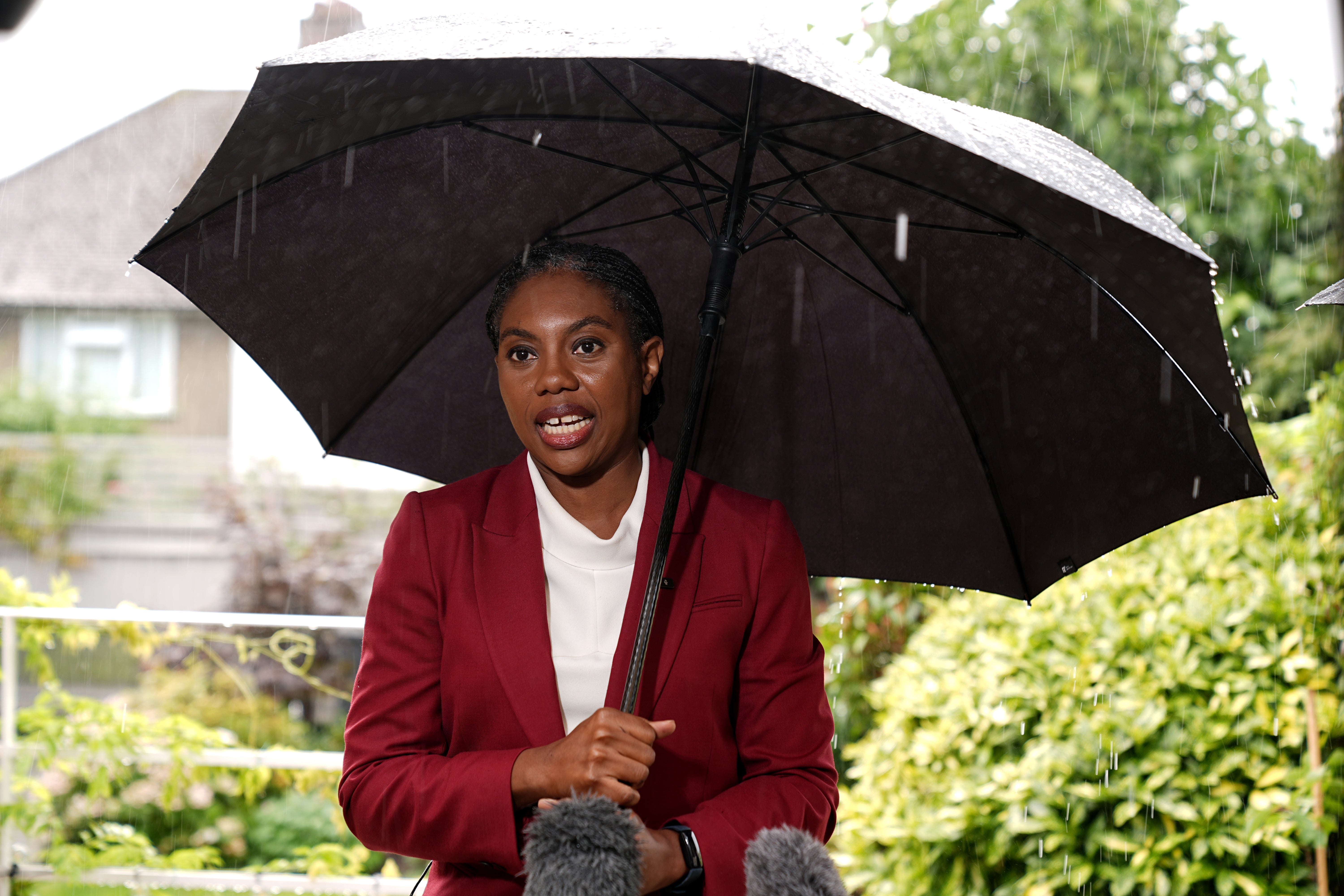 Leader of the Conservative Party Kemi Badenoch filming a clip for the press, during a housing visit in Redhill, near Reigate