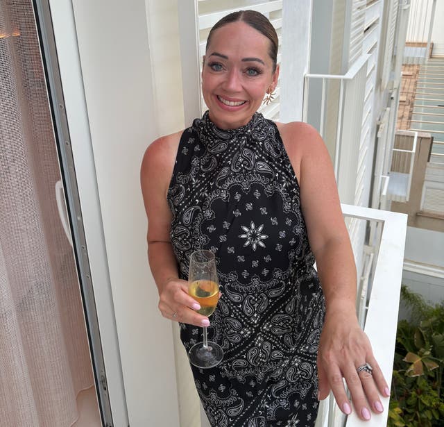 <p>Well-deserved drink: Claire Hannington, who was wrongly turned away by British Airways staff at Gatwick</p>