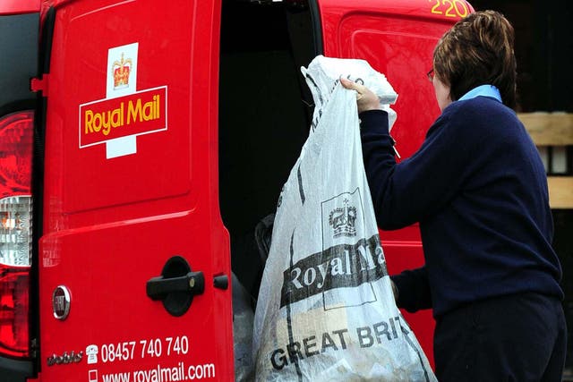 <p>The owner of Royal Mail has said it will take ‘many months’ to ditch second class letter deliveries on Saturdays across the UK (Rui Vieira/PA)</p>