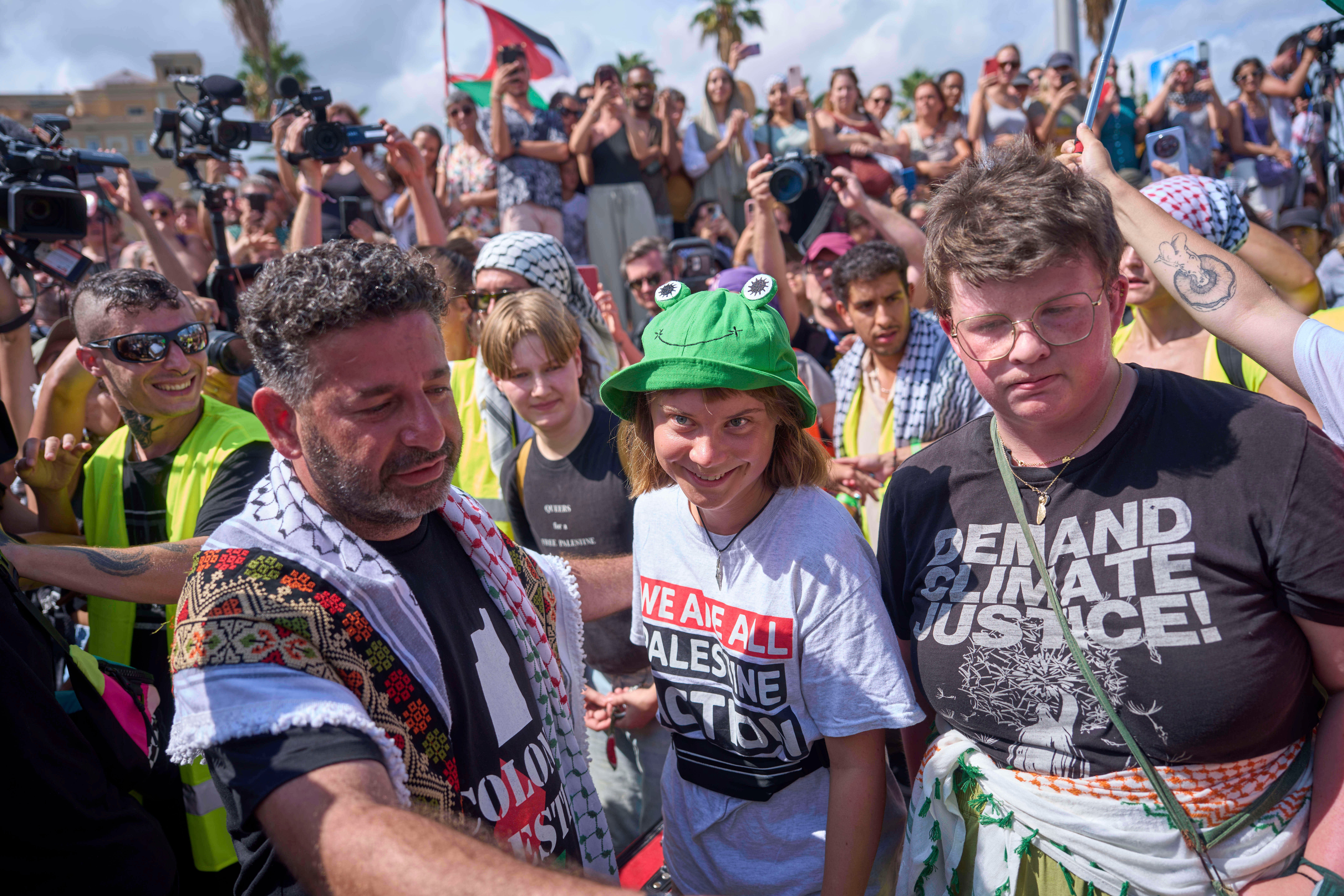 Thunberg with other activists at port in Barcelona