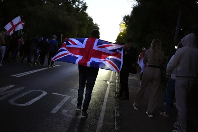 Protesters marching in Epping, Essex after a temporary injunction that would have blocked asylum seekers from being housed at the Bell Hotel, was overturned at the Court of Appeal (Jordan Pettitt/PA)