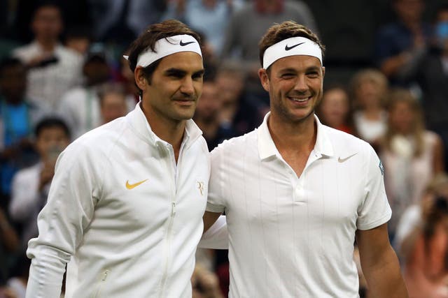 Marcus Willis was a Wimbledon sensation when he played Roger Federer, left, on Centre Court (Steve Paston/PA)