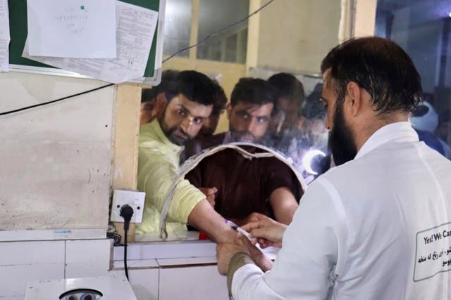 <p>In this photo released by the Ministry of Public Health, Afghans donate blood for victims of an earthquake that killed hundreds and destroyed numerous villages in eastern Afghanistan, at Nangarhar Regional Hospital in Nangarhar, Monday, Sept. 1, 2025</p>