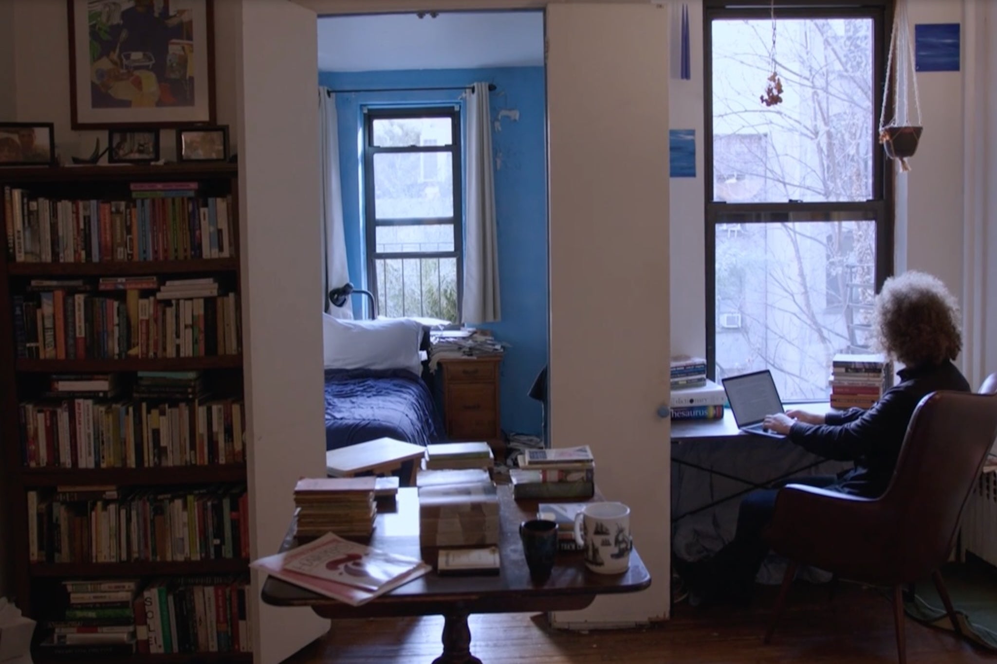 An apartment of memories: Sussman pictured at his writing desk at his mother’s New York City apartment, where Bob Dylan was a frequent visitor