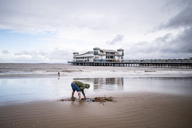 Rain and wind is expected across the country after the warmest summer on record (Ben Birchall / PA)