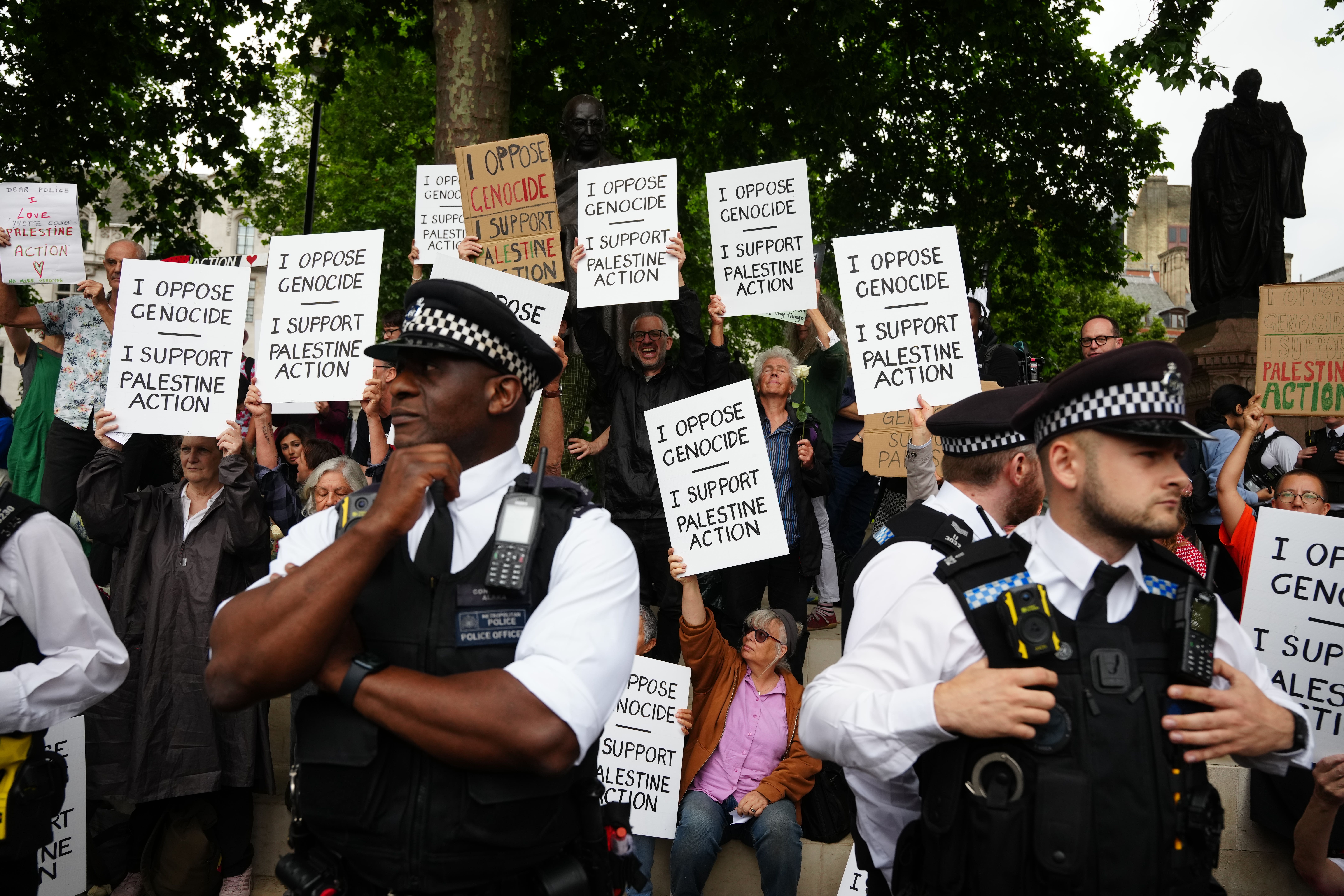 <p>An earlier protest in central London in support of Palestine Action was organised by the Defend Our Juries group (Jeff Moore/PA)</p>