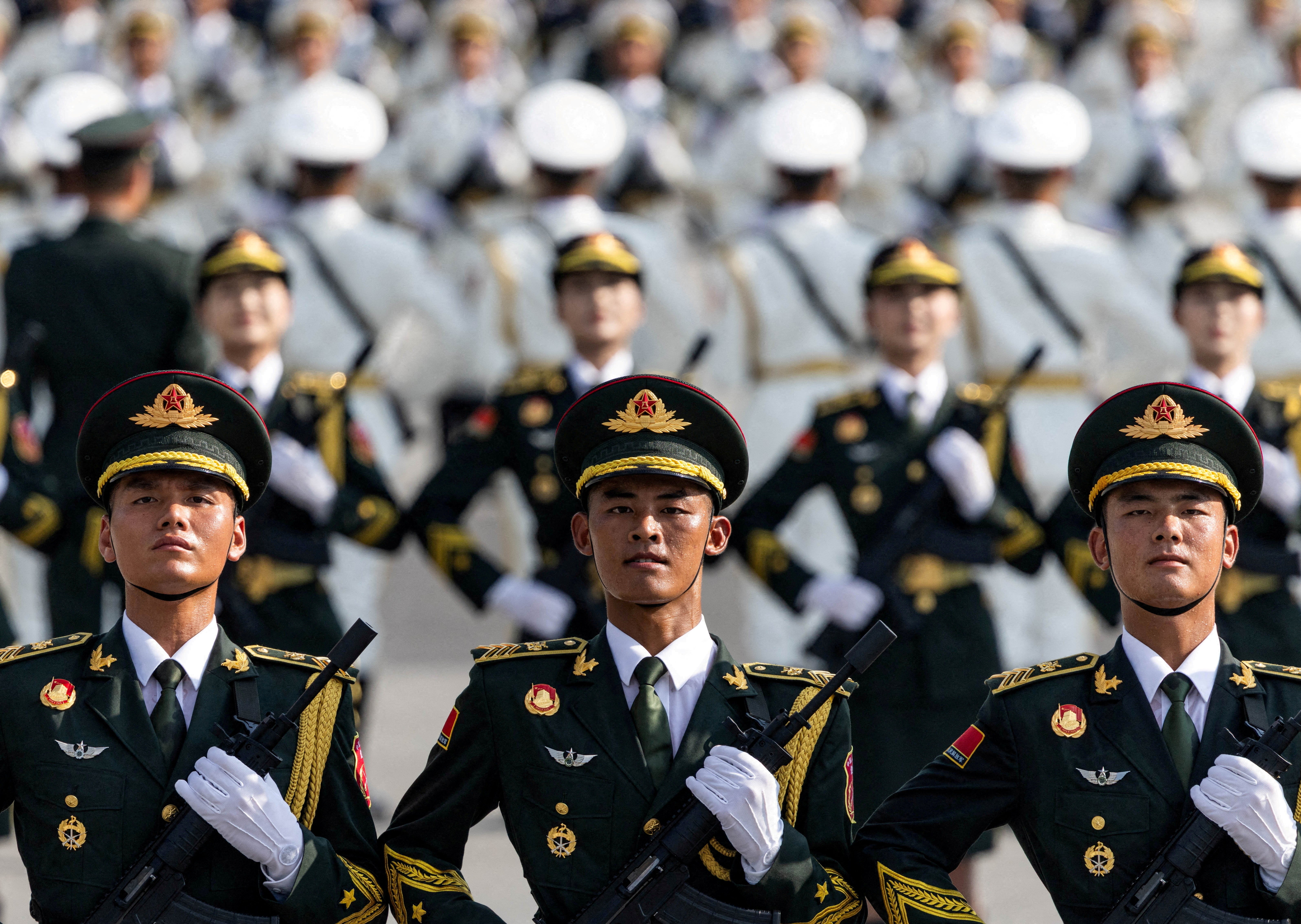 Soldiers of the People's Liberation Army (PLA) of China attend training