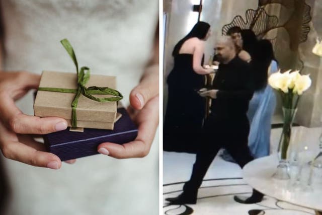 <p>A man wearing all black was caught on camera taking a box holding cash and checks at a California wedding </p>