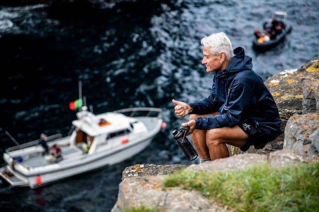 <p>Greg Louganis of the USA reacts during the final competition day of the fourth stop of the Red Bull Cliff Diving World Series </p>