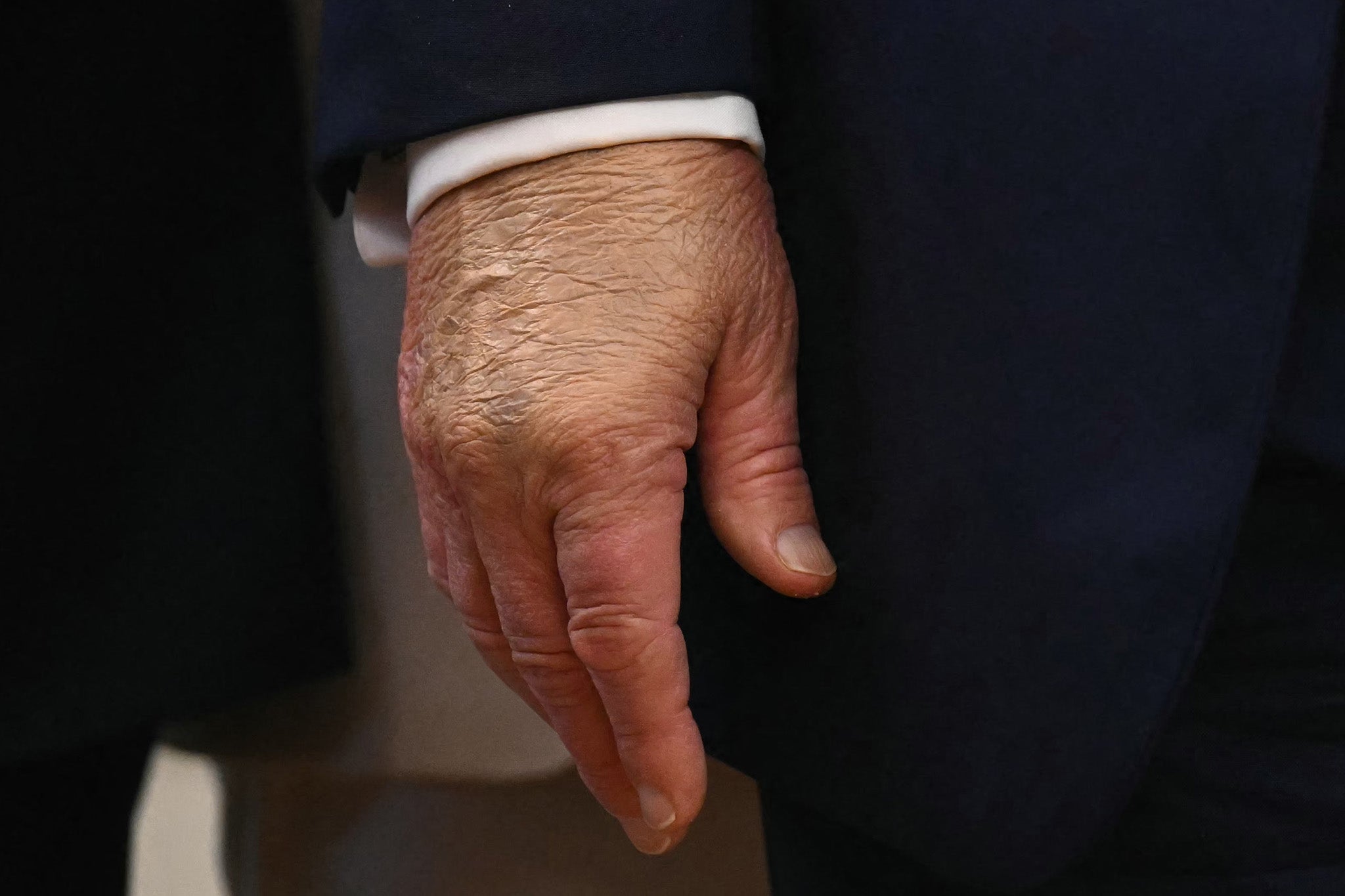 Trump appeared to have makeup on his hand during the press conference announcing the Space Command’s new location.