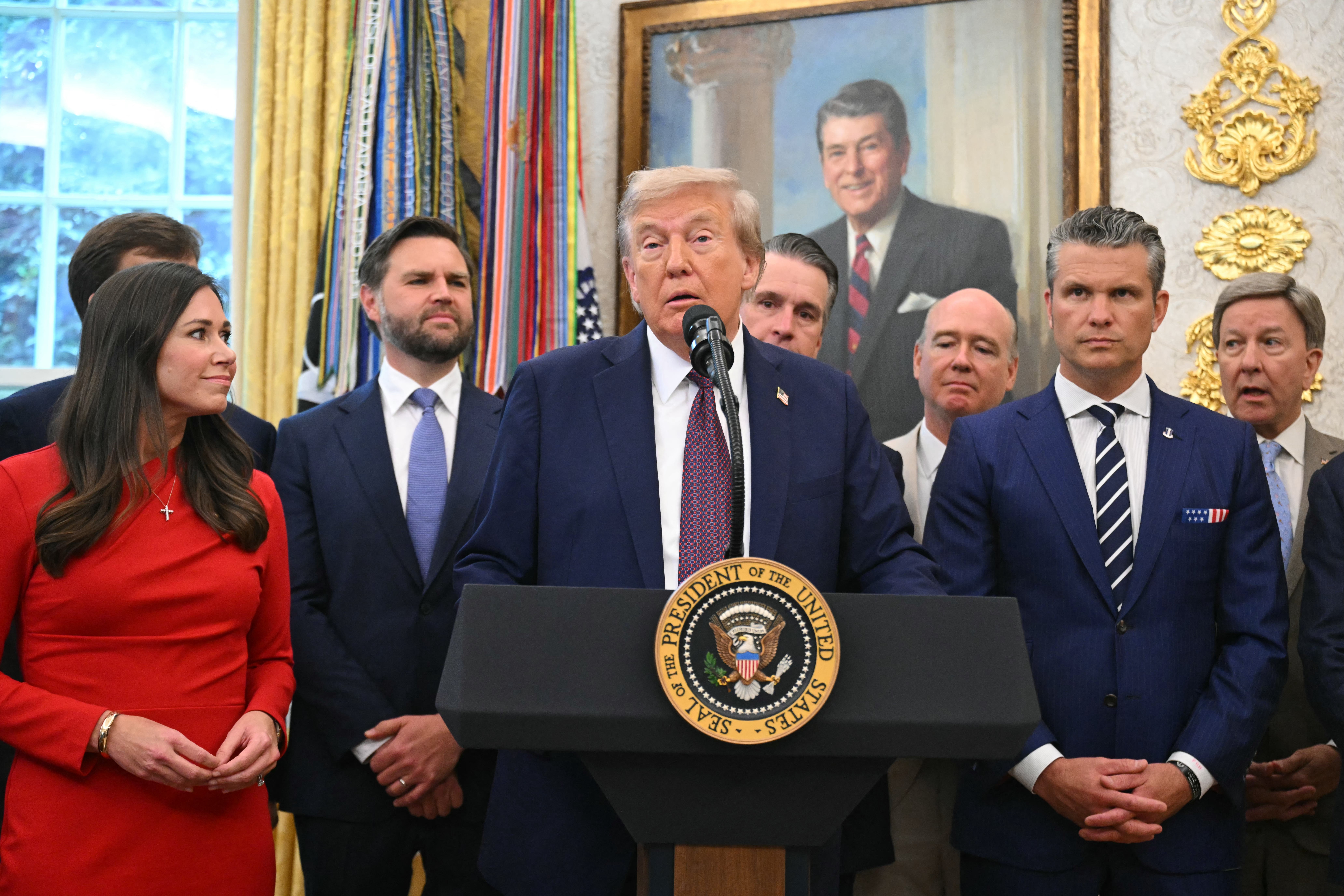 President Donald Trump appeared to be in good health during a scheduled White House press conference on Tuesday that followed a weekend of online speculation that his health had taken a toll.