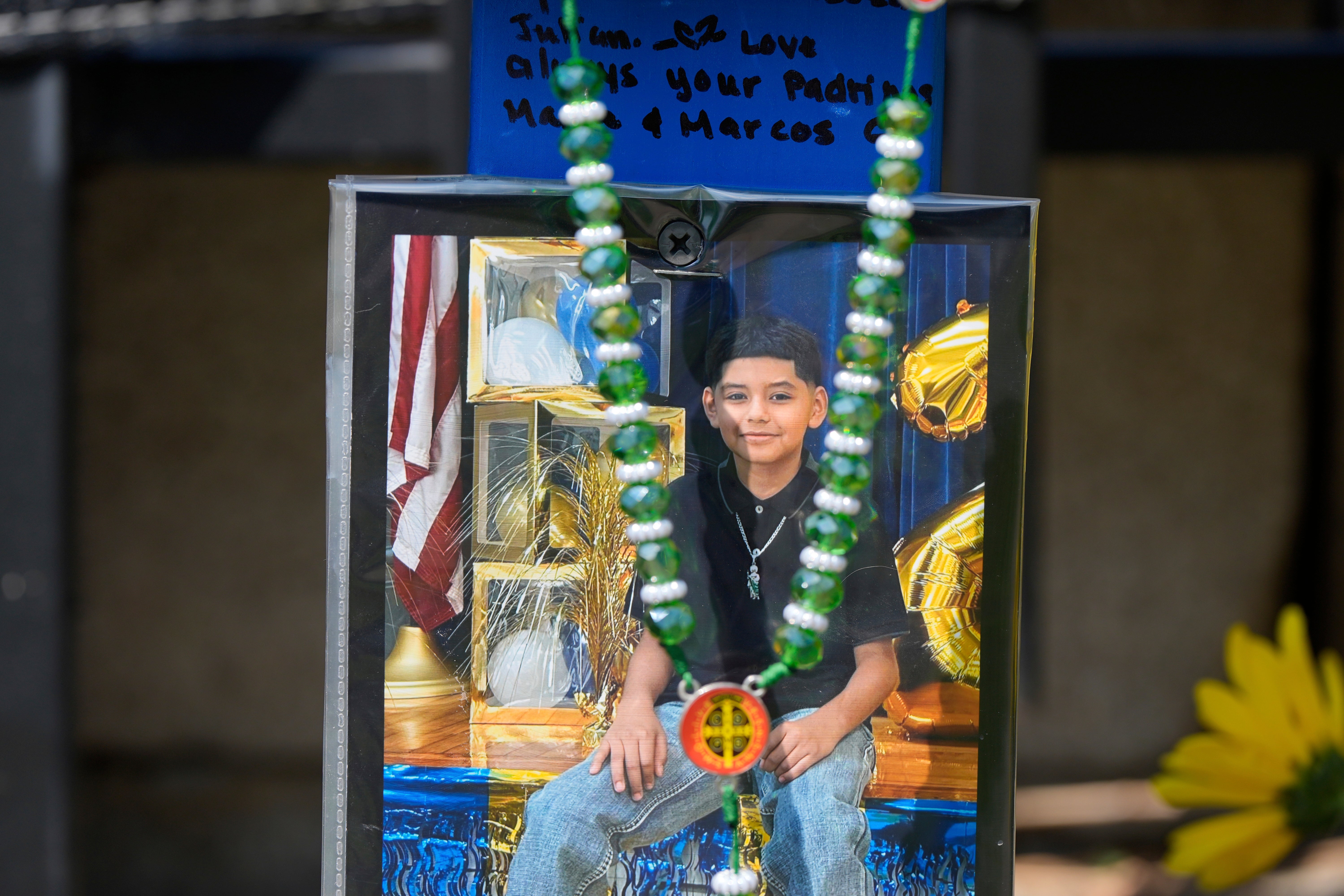 A makeshift memorial for 11-year-old Julian Guzman, who was allegedly shot and killed by Texas Army veteran Gonzalo Leon. Leon has been charged with murder and his bond has been set at $1 million