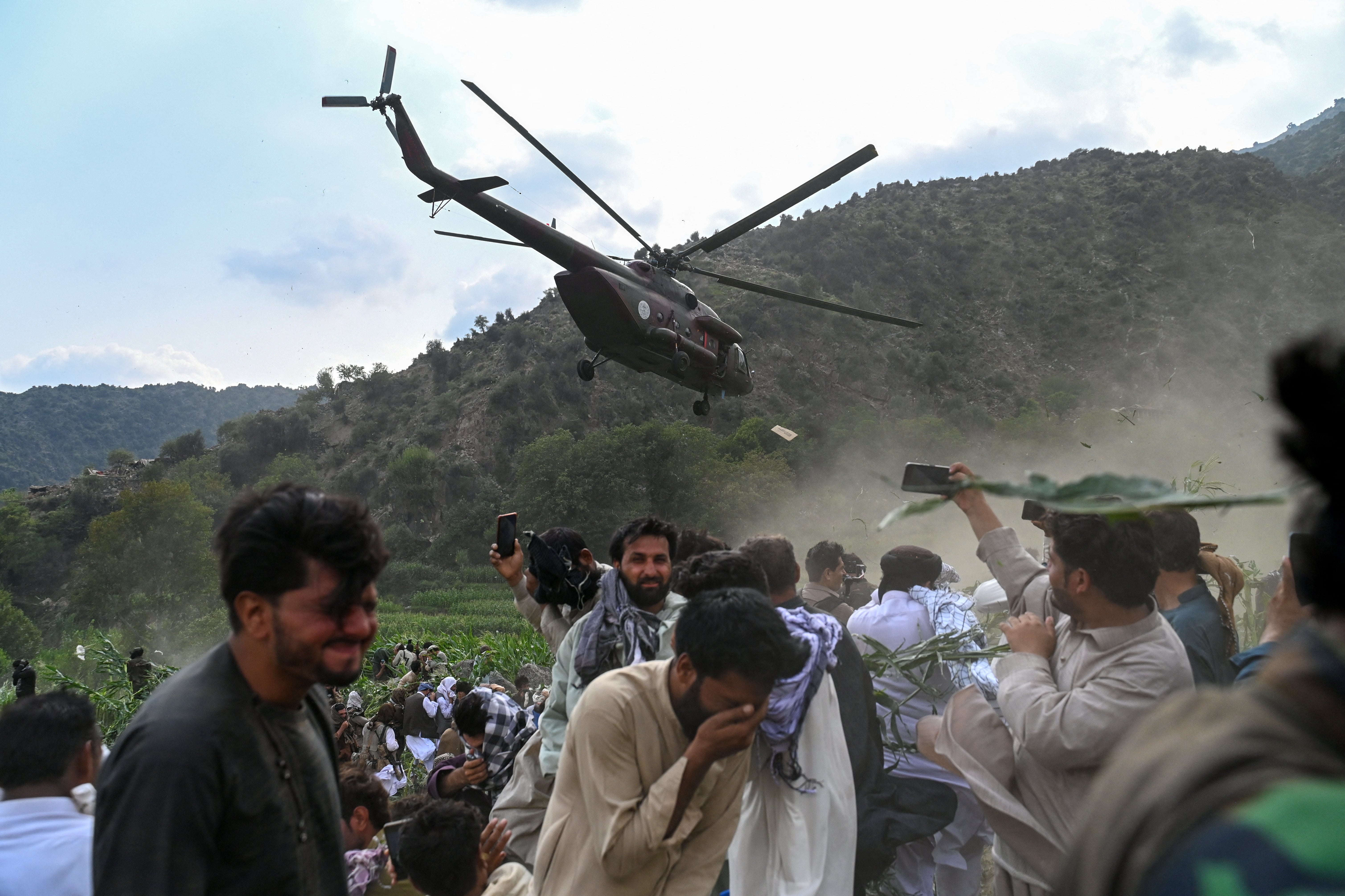 <p>A military helicopter airlifts injured Afghans at Mazar Dara village in Nurgal district of Kunar province on 1 September 2025</p>