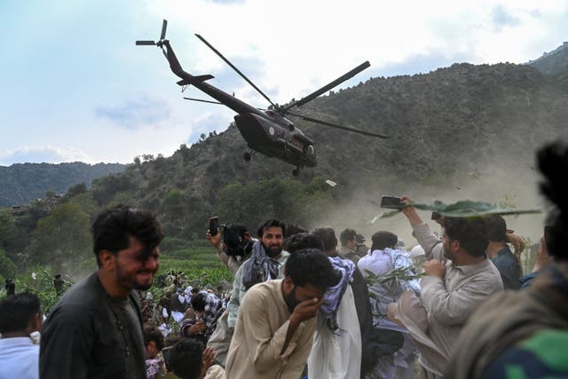 <p>A military helicopter airlifts injured Afghans at Mazar Dara village in Nurgal district of Kunar province on 1 September 2025</p>