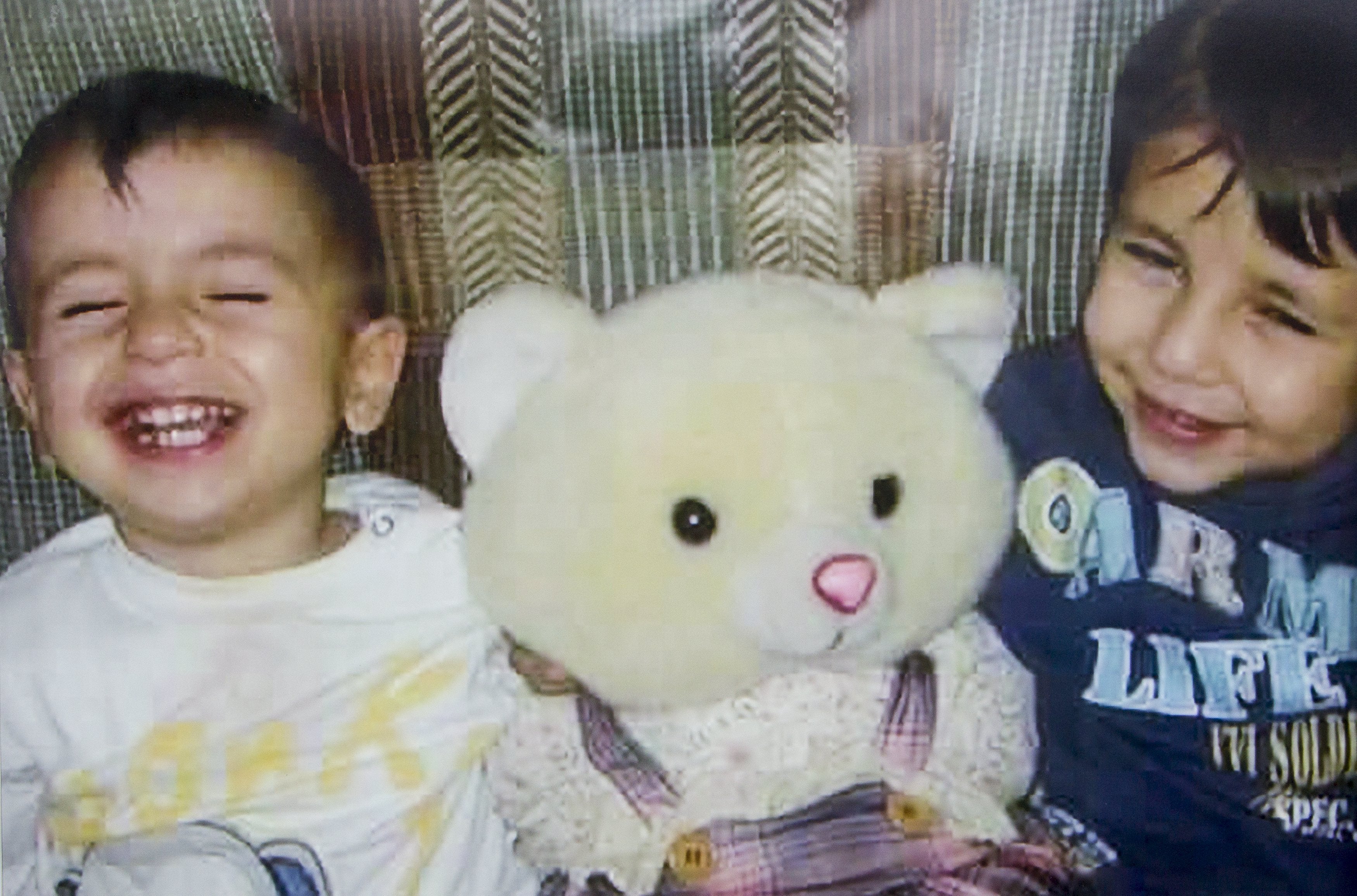 Alan Kurdi pictured with his brother at a home in British Columbia, Canada