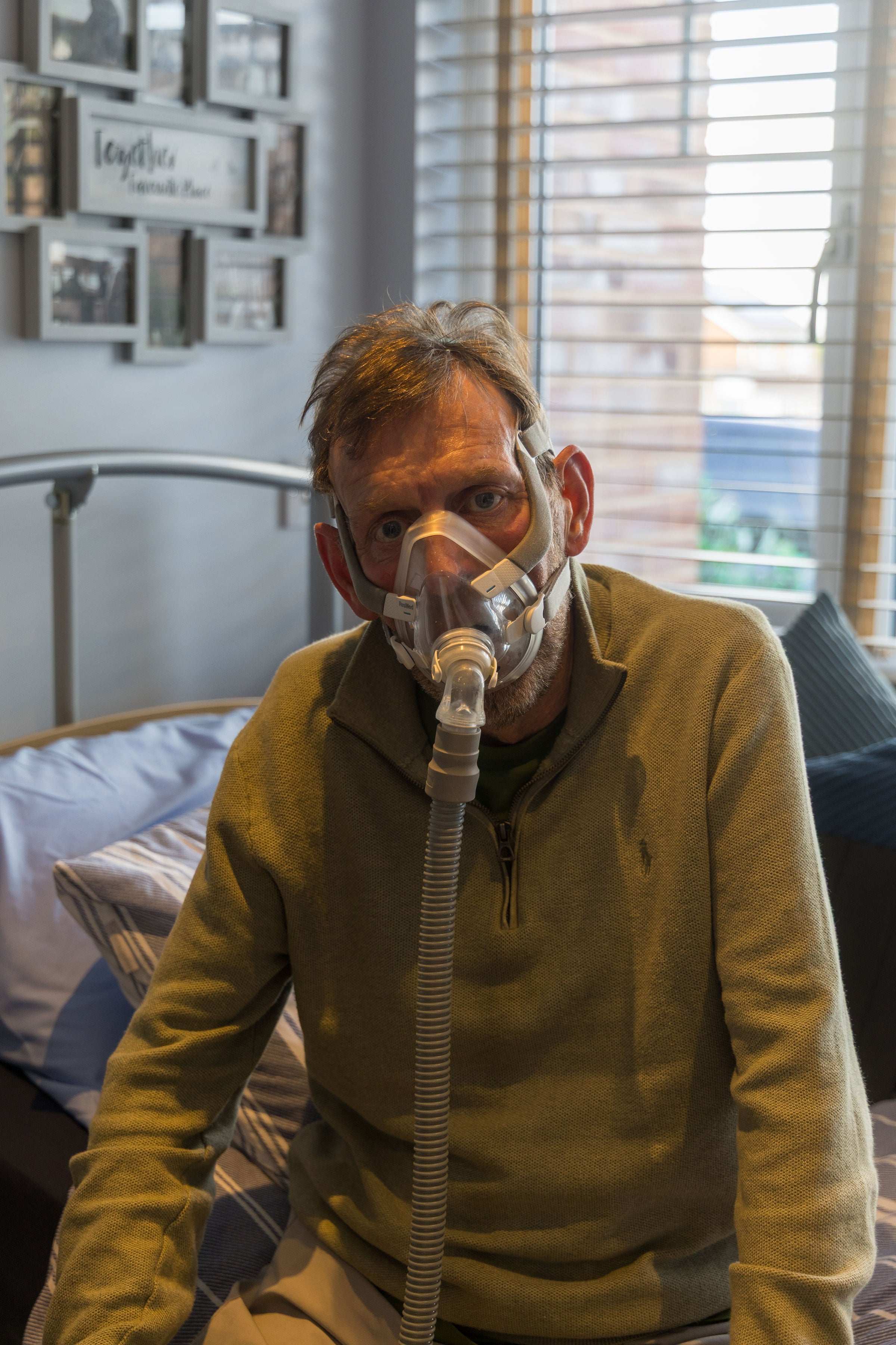 Mr Scott using a breathing device