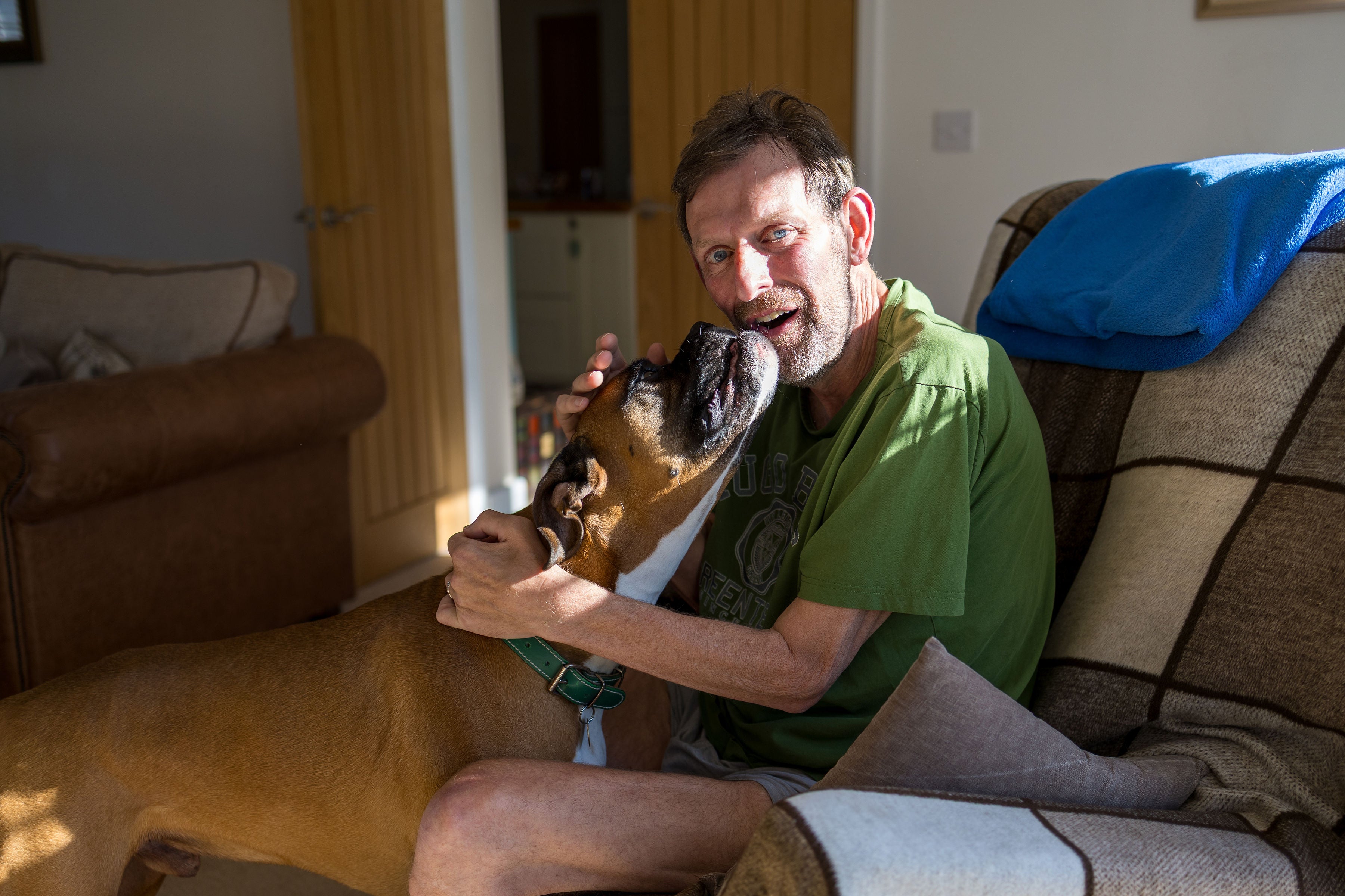 <p>David Scott, pictured with his Boxer dog Will, was diagnosed in early 2024 </p>