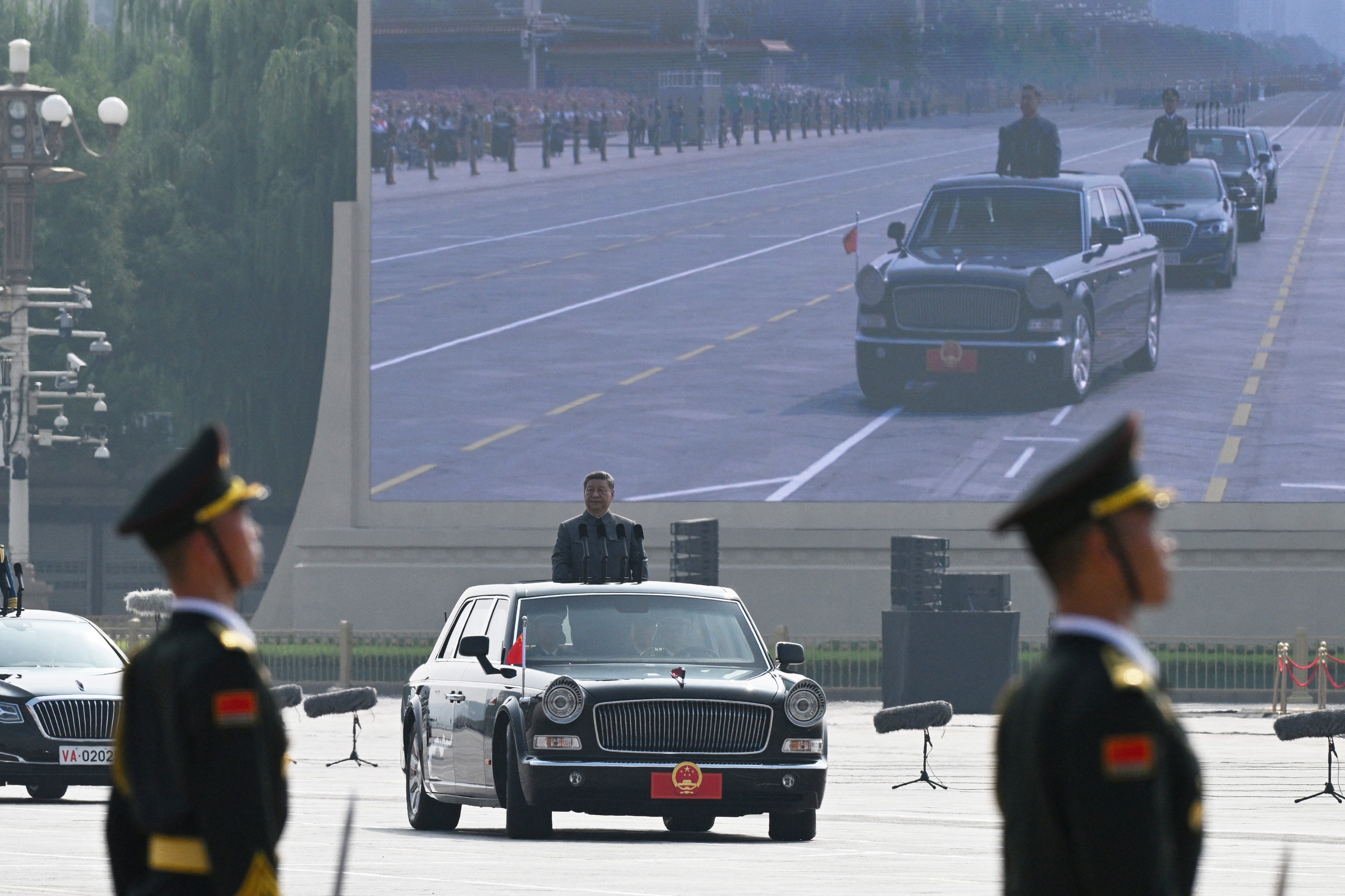 China's president Xi Jinping inspects the troops during a military parade marking the 80th anniversary of victory over Japan and the end of World War II, in Beijing's Tiananmen Square on 3 September 2025