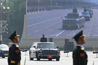 China's president Xi Jinping inspects the troops during a military parade marking the 80th anniversary of victory over Japan and the end of World War II, in Beijing's Tiananmen Square on 3 September 2025