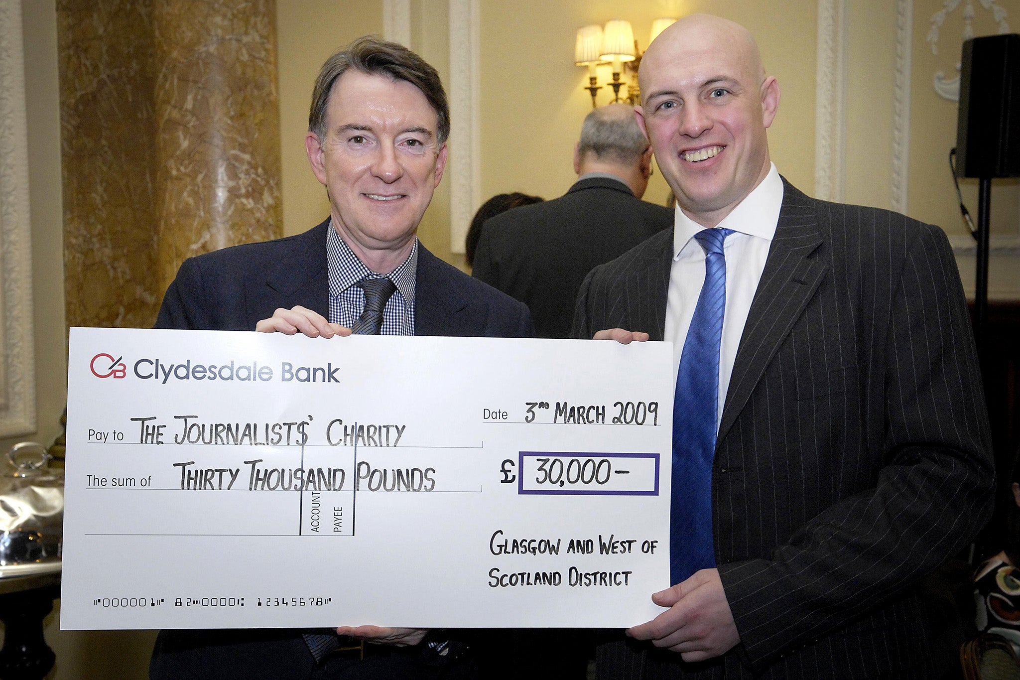 Lord Mandelson with newly appointed head of government communications David Dinsmore at a charity lunch in London