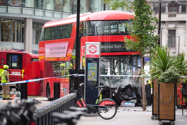 Emergency services at the scene of a bus crash in central London (James Manning/PA)