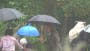 Sweet moment Kate shields children during rain as she debuts new hair