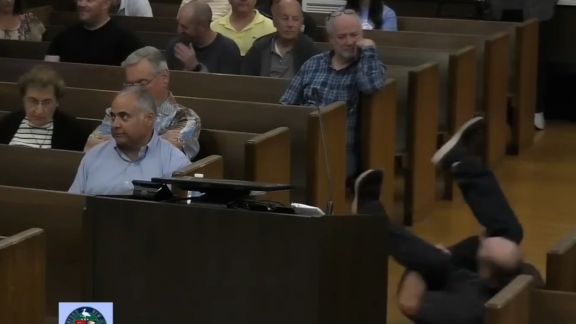 <p>New Jersey man breakdances during town hall meeting </p>