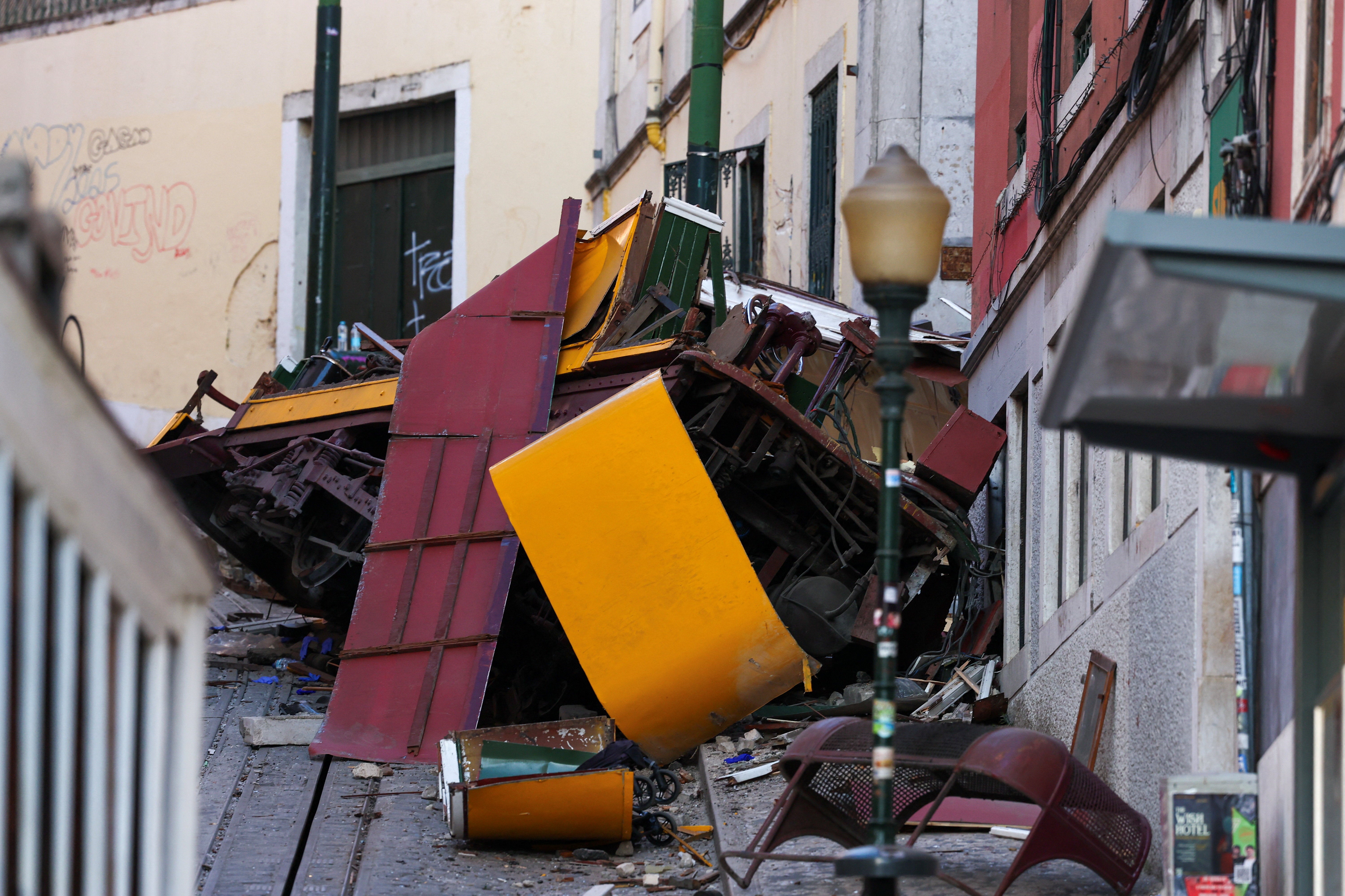 The wreckage of the Glória Funicular, which killed 16 people after it derailed