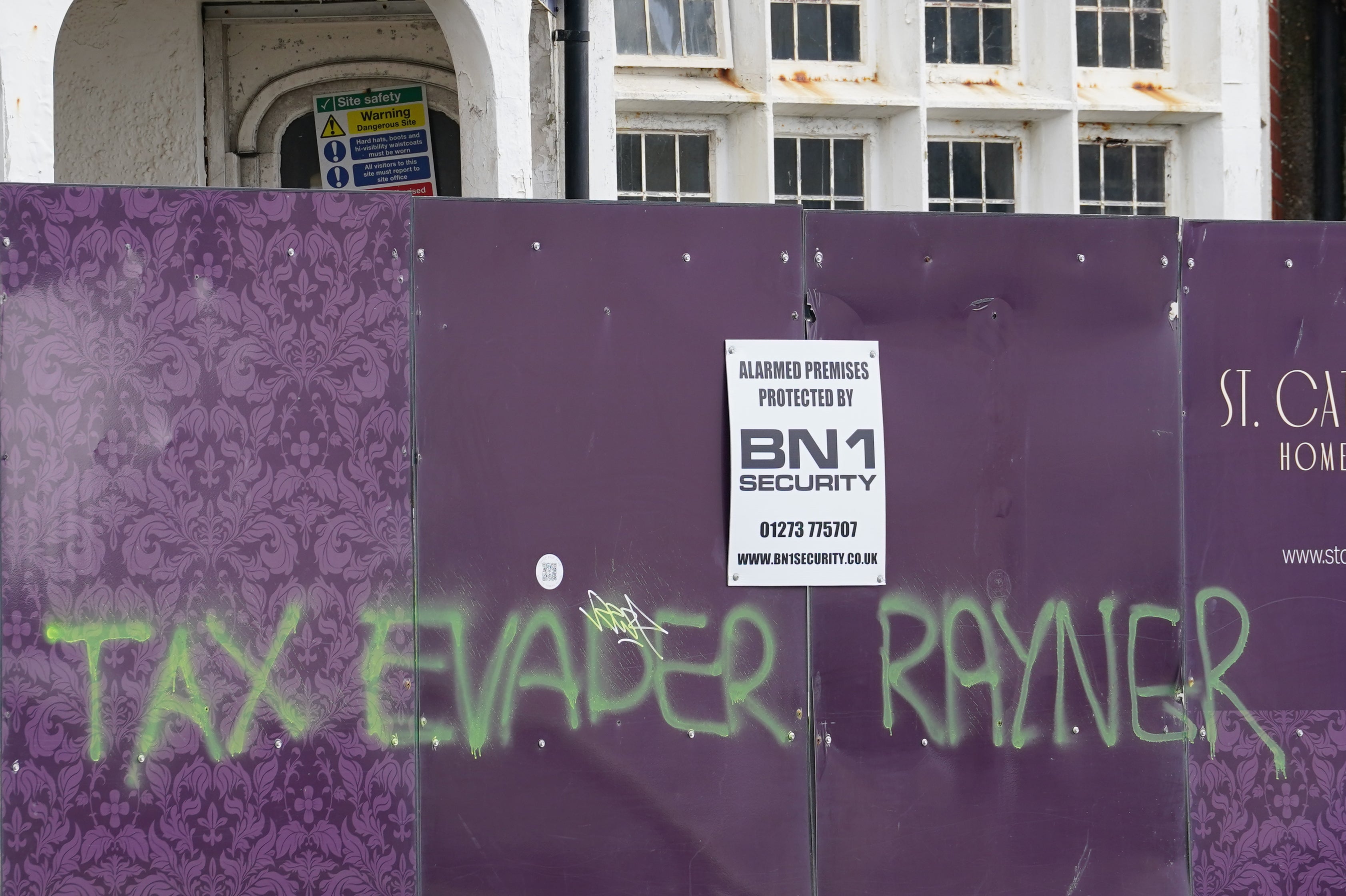 Graffiti daubed close to the apartment building in Hove, East Sussex, where Deputy Prime Minister Angela Rayner owns a second home