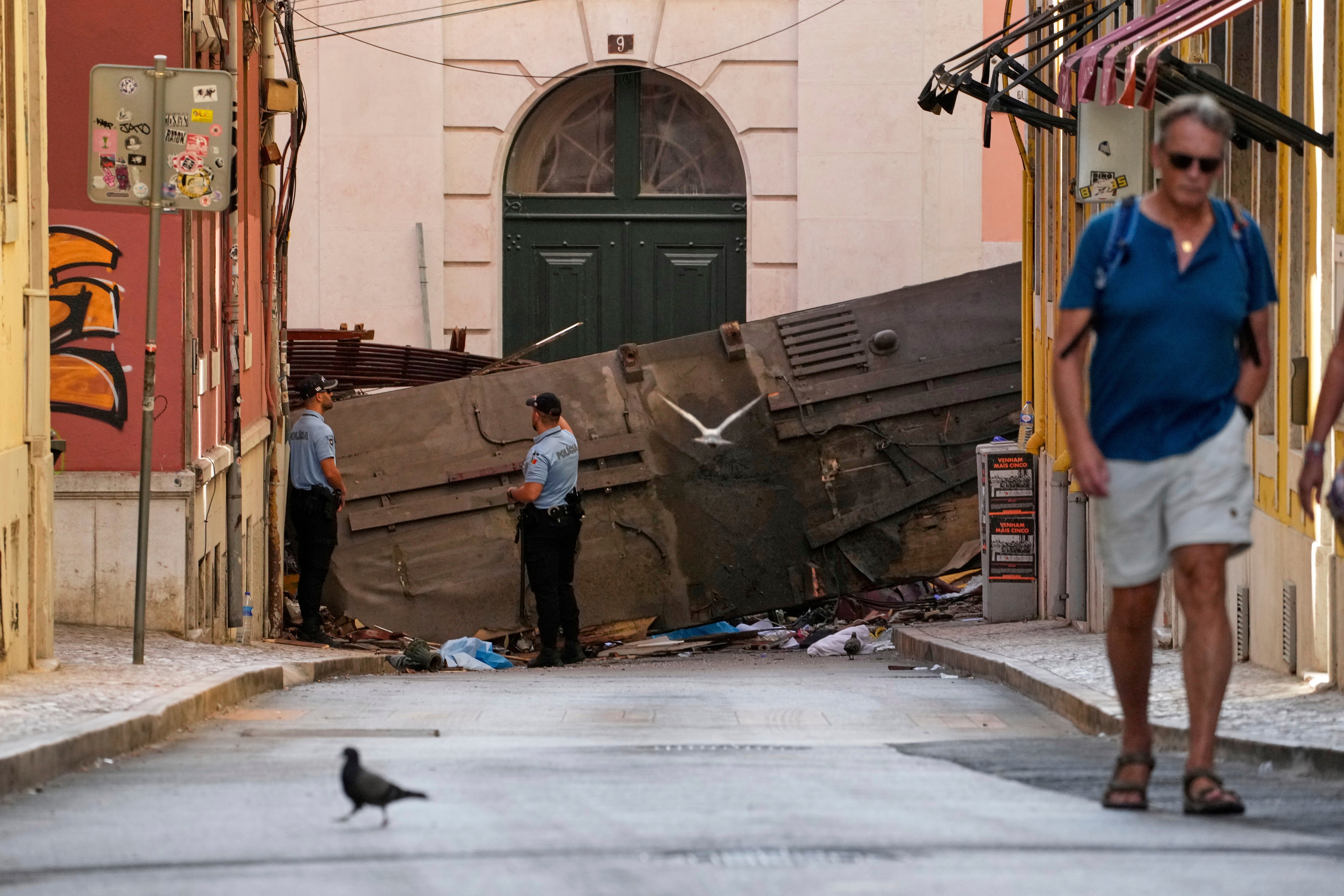 APTOPIX Portugal Streetcar Derailed