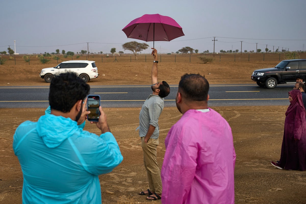 Promise and peril drive the fascination with rain in the parched deserts of  the United Arab Emirates | The Independent