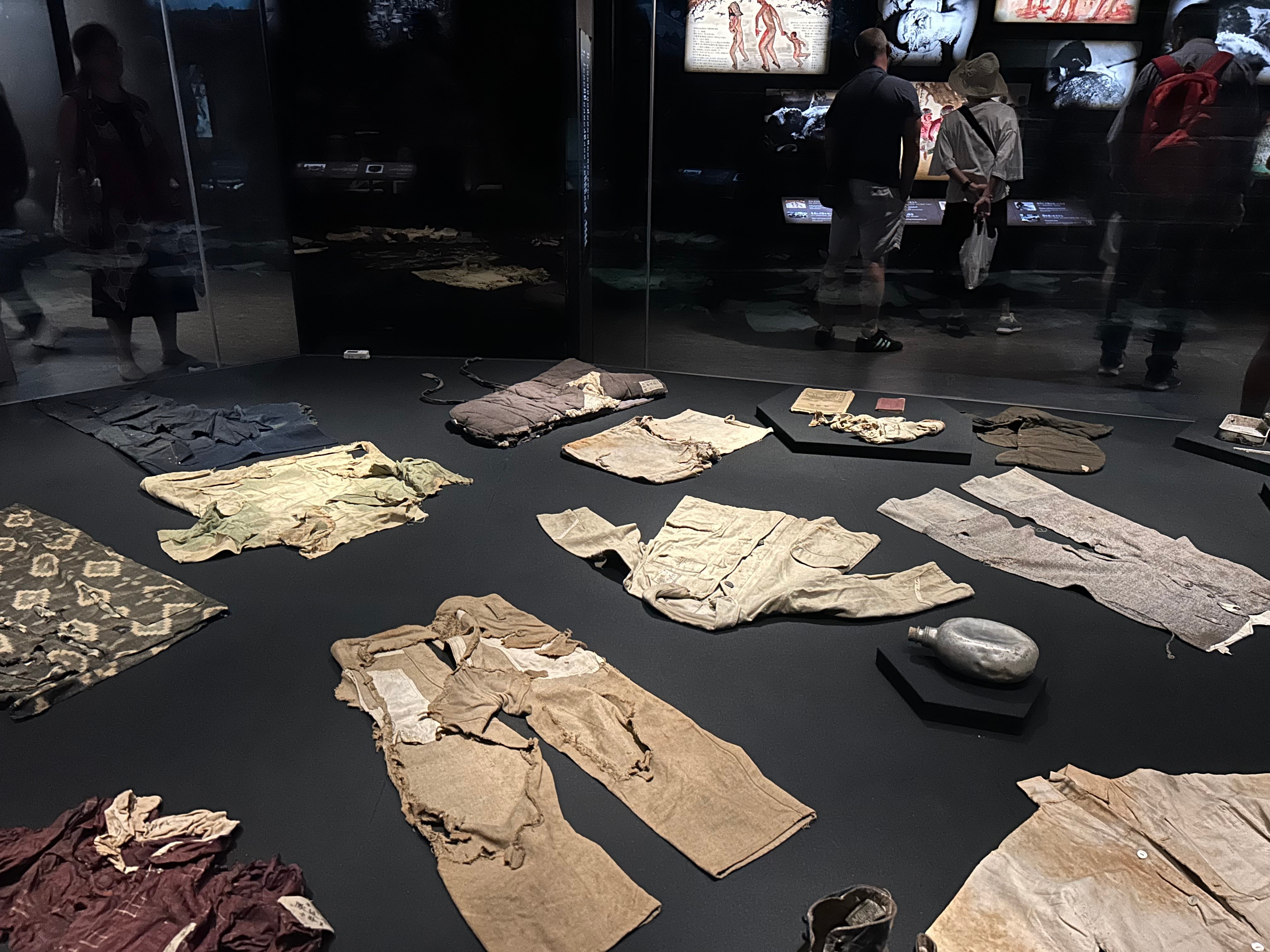 Burnt and torn clothing belonging to school children caught up in the devastation wrought by the nuclear bomb is displayed in the museum