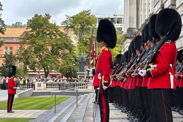 The Irish Guards take part in a Remembrance Service at Belfast City Hall (Rebecca Black/PA)