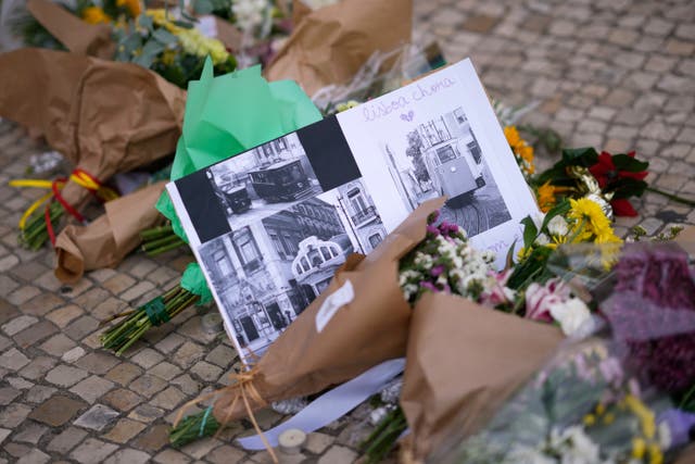 <p>Tributes at the site in Lisbon, Portugal</p>