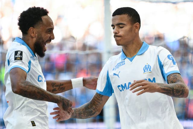 <p>Mason Greenwood, right, is rebuilding his career at Marseille</p>