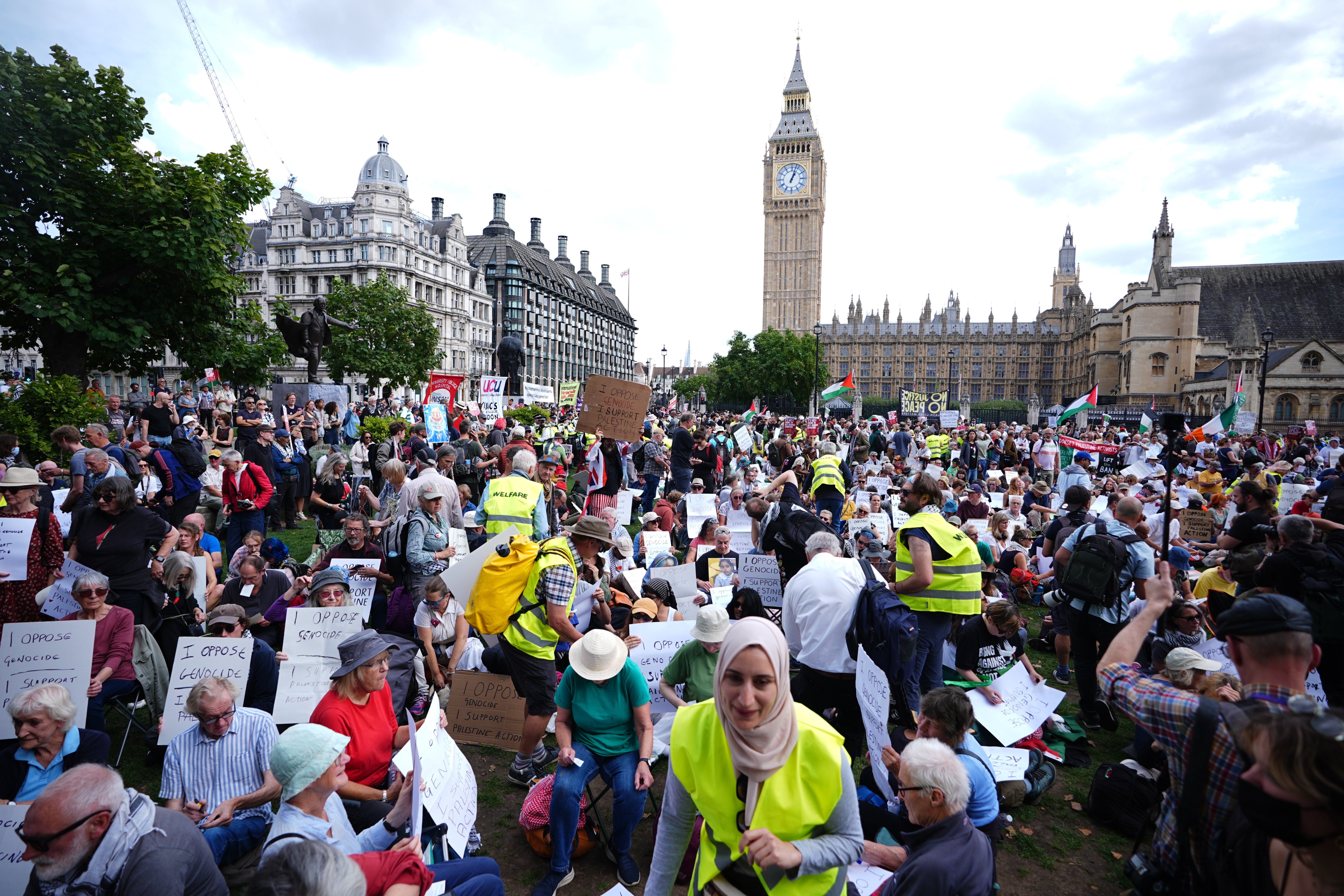 Hundreds are holding placards which read: 'I oppose genocide, I support Palestine Action'