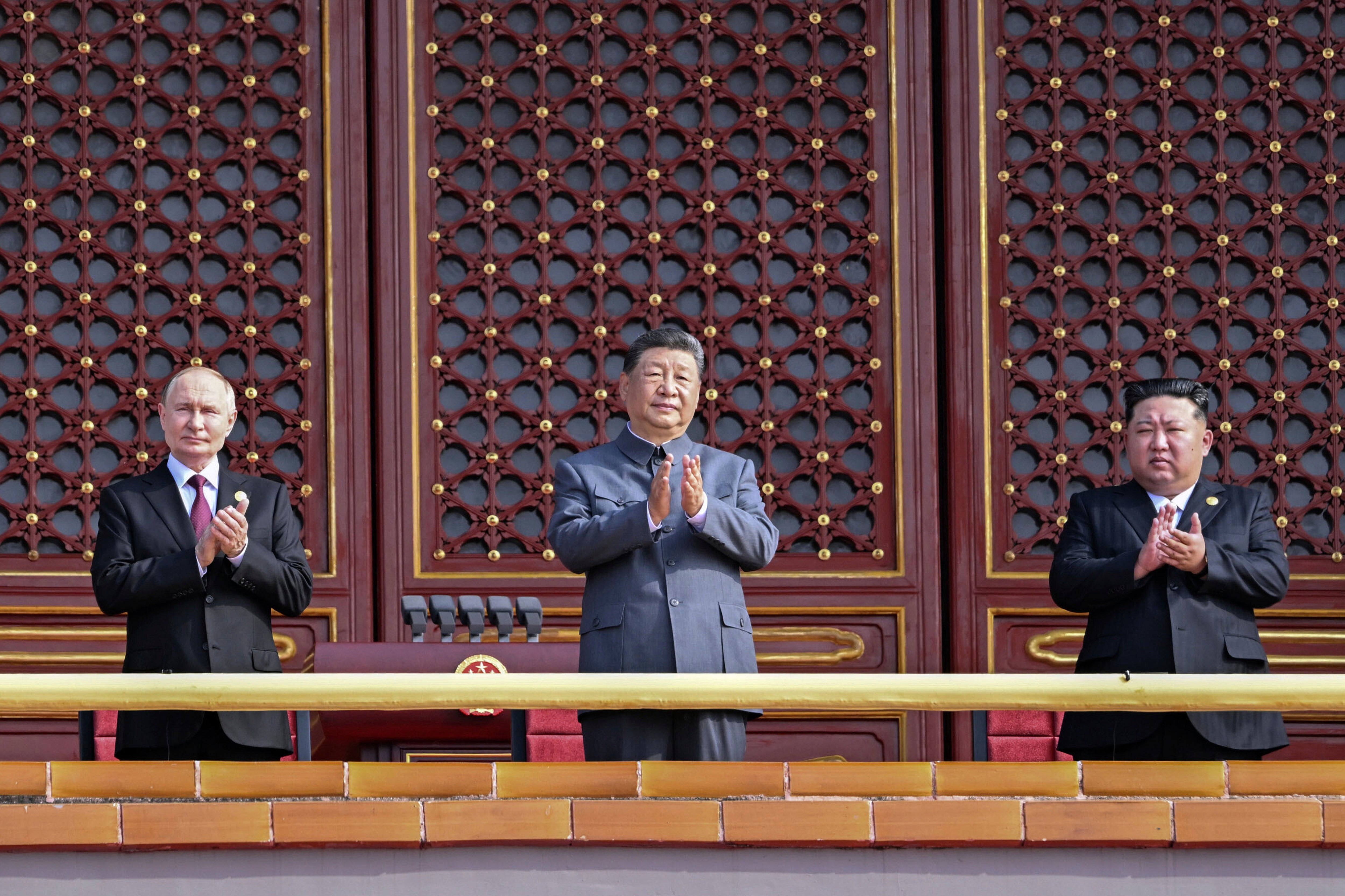 Vladimir Putin, Xi Jinping and Kim Jong Un attend a military parade to mark the 80th anniversary of the end of the Second World War at Tiananmen Square in Beijing on 3 September