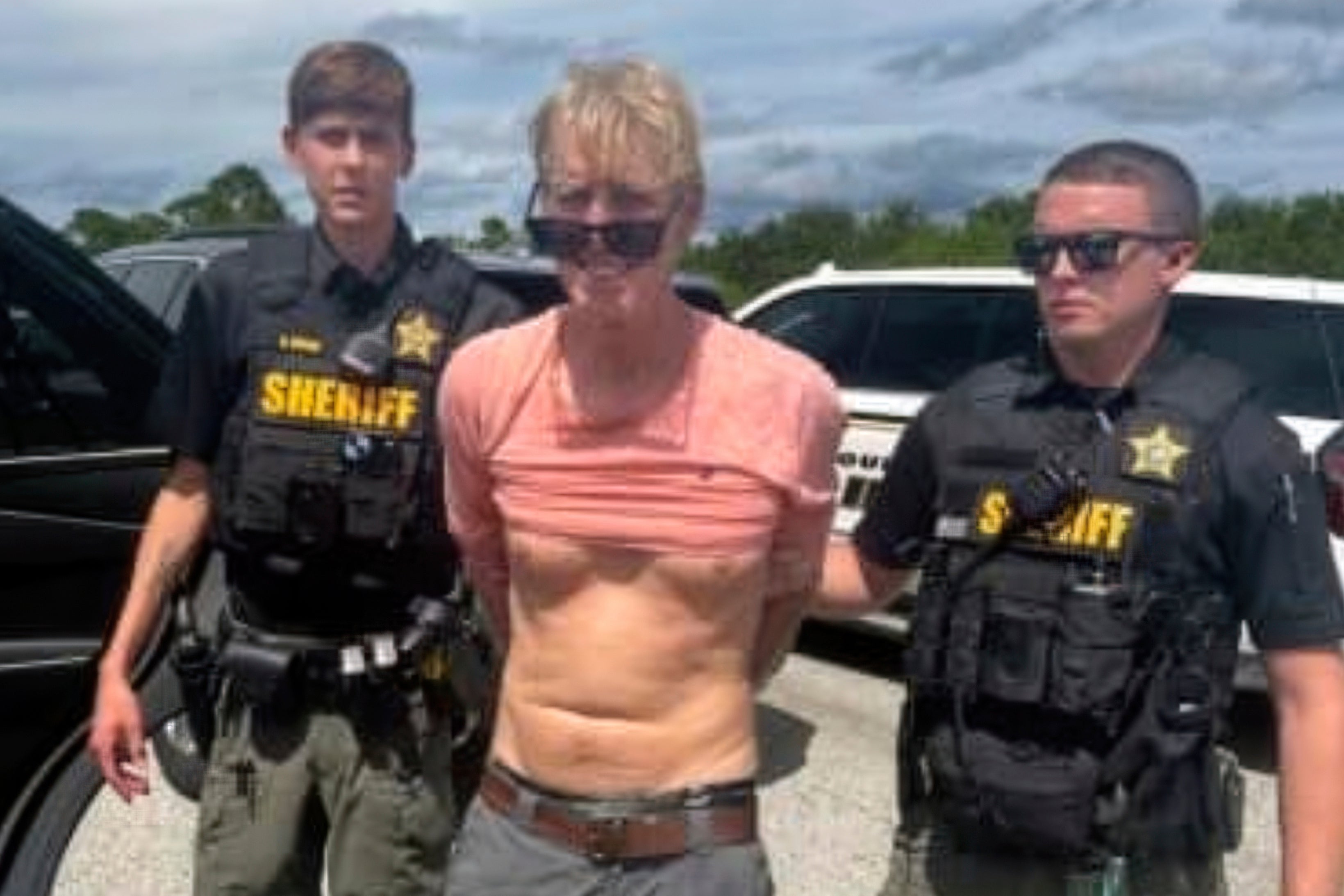 In this imaged released by the Martin County, Fla., Sheriffís Office, law enforcement officers arrest Ryan Routh, the man suspected in the apparent assassination attempt of Donald Trump, Sept. 15, 2024.