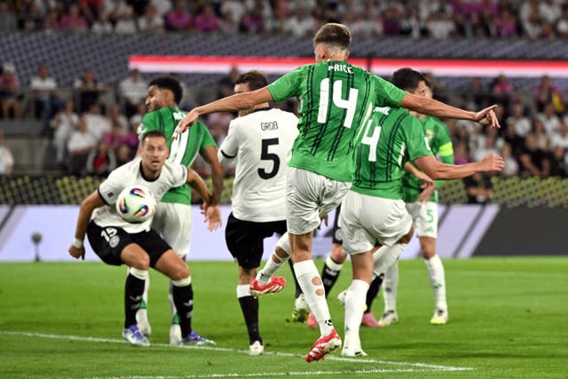 Isaac Price scores Northern Ireland’s equaliser (PA Wire)