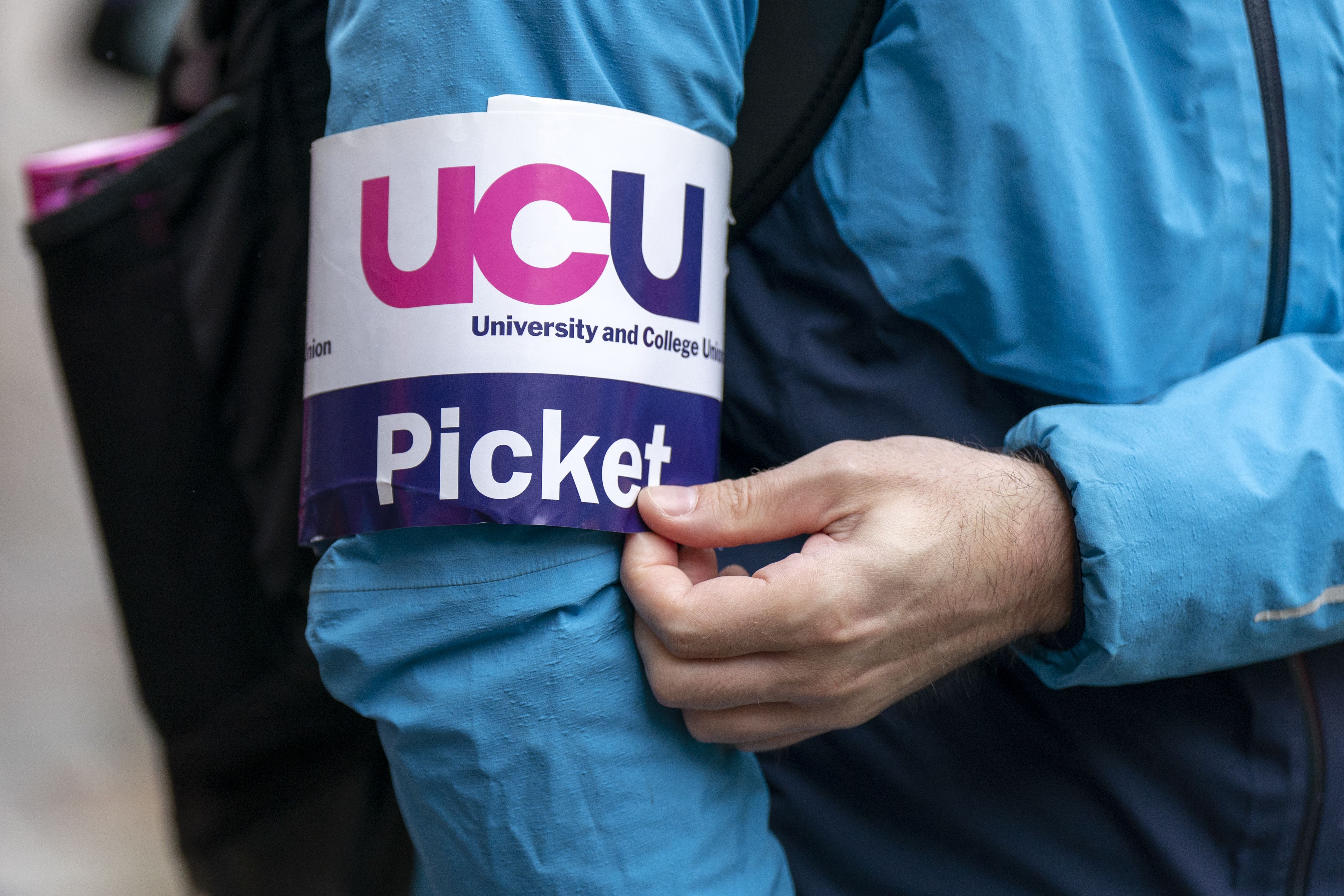 UCU members at the University of Edinburgh are beginning a 5-day walkout in a dispute over plans to cut £140 million from the university’s budget (Jane Barlow/PA)