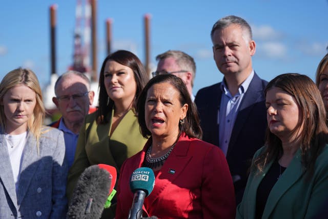 Sinn Fein leader Mary Lou McDonald (centre) with her Oireachtas team speaks to the media (Niall Carson/PA)