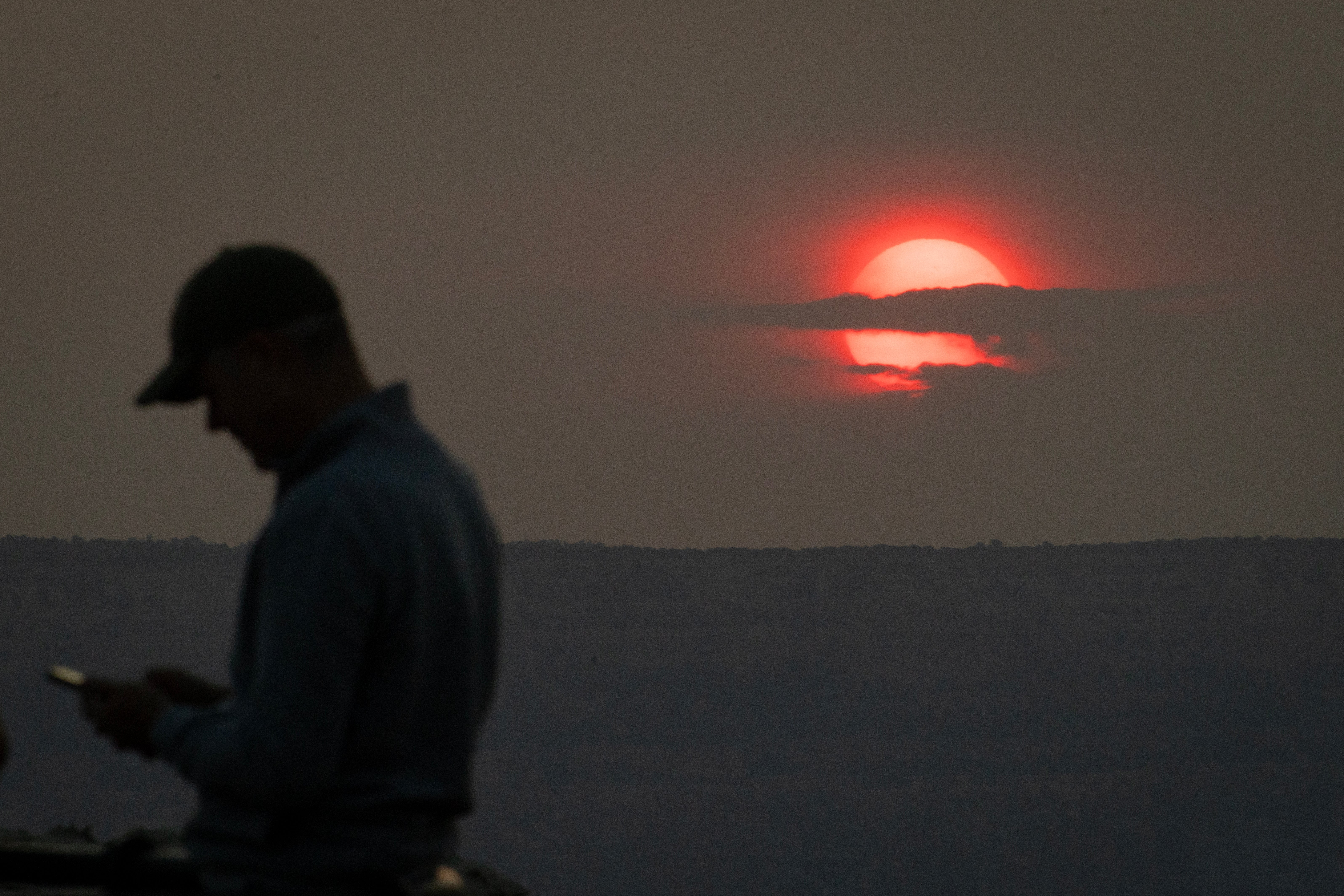 <p>Smoke from a wildfire fills the skies over Arizona’s Grand Canyon last July. Air pollution from wildfires and other sources across the US has been found to make Alzheimer’s disease worse, researchers said Monday</p>