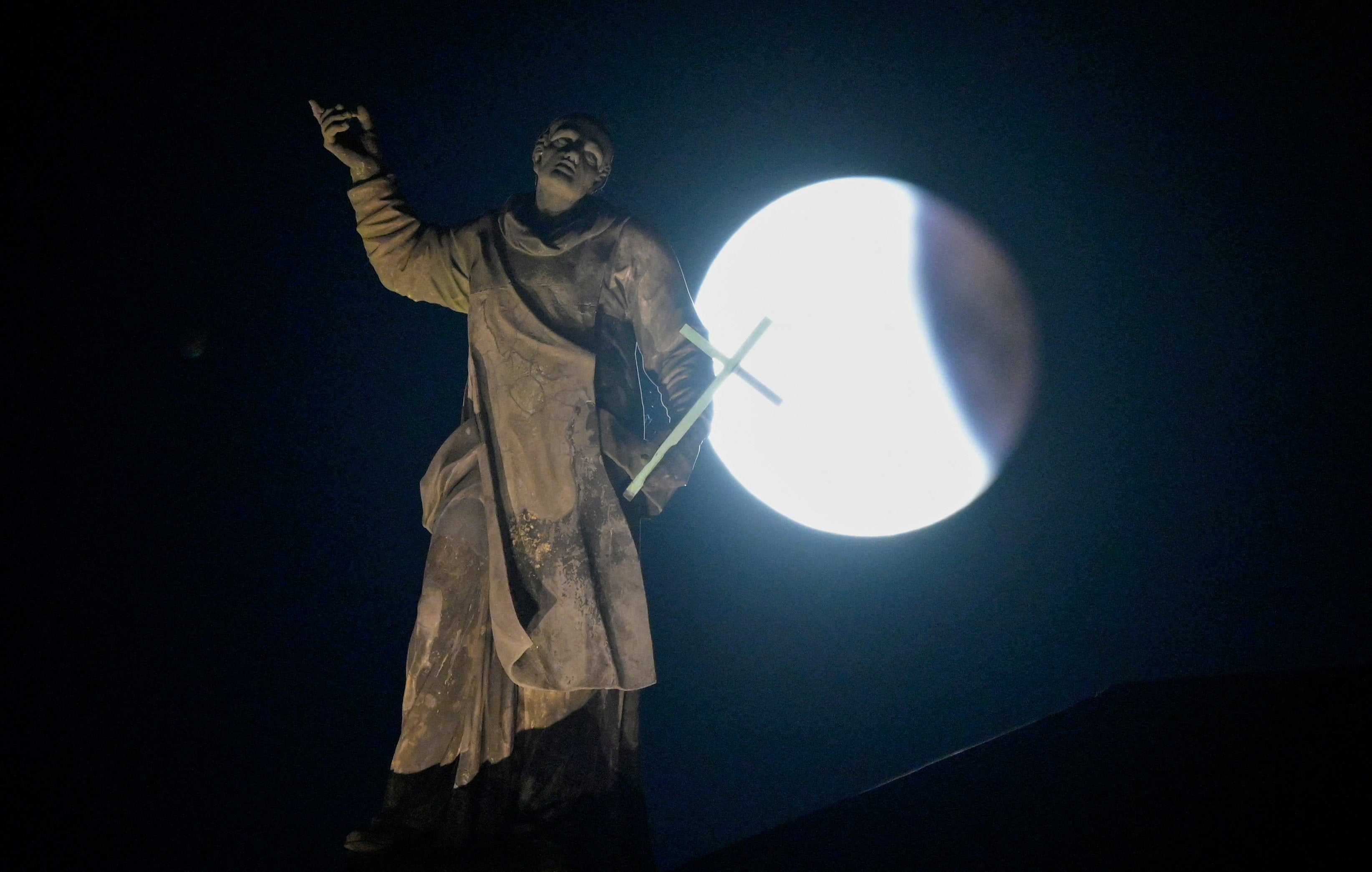 A full moon is seen during a 
