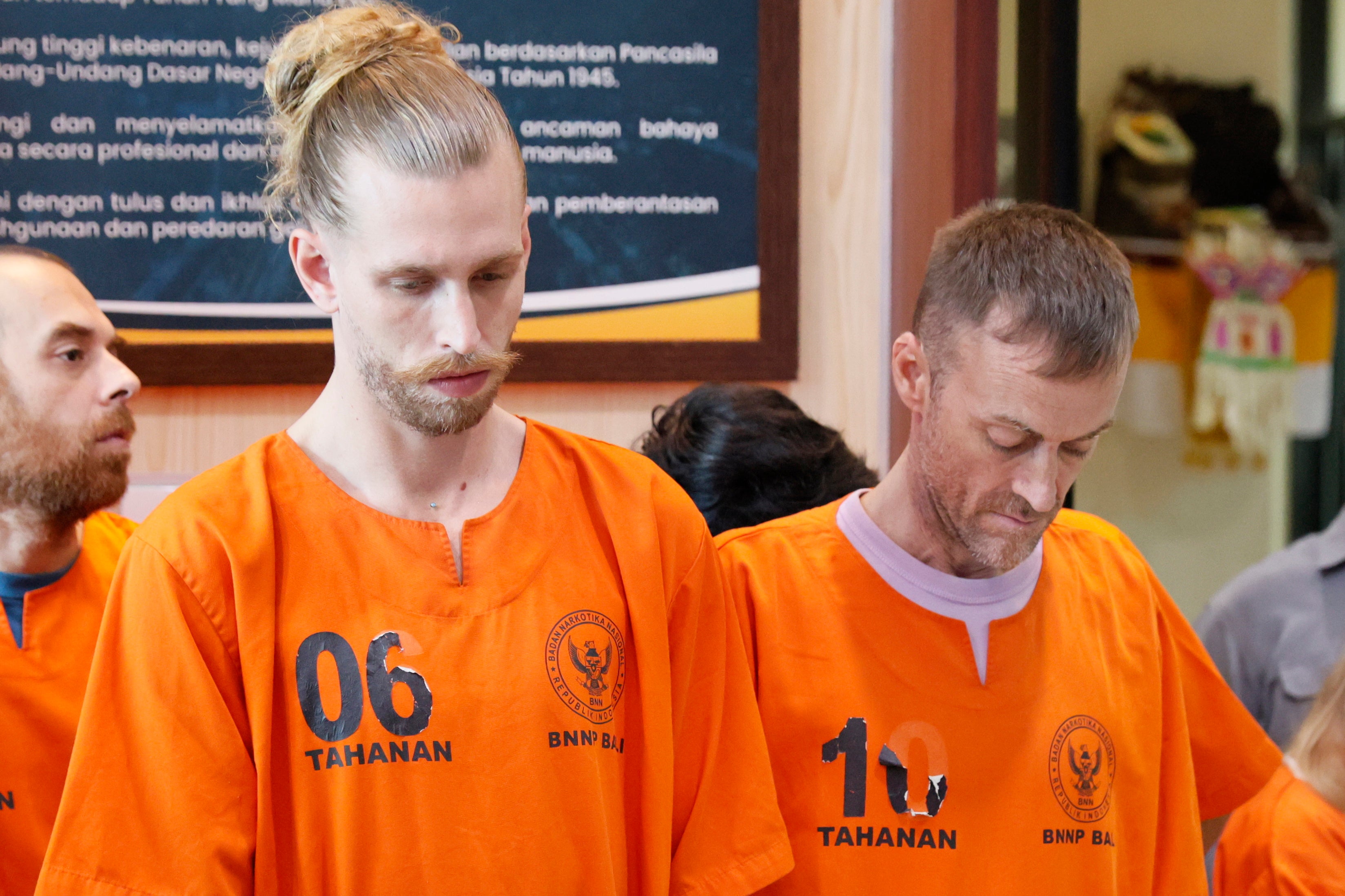 The men appeared in prison uniforms at a press conference in Denpasar