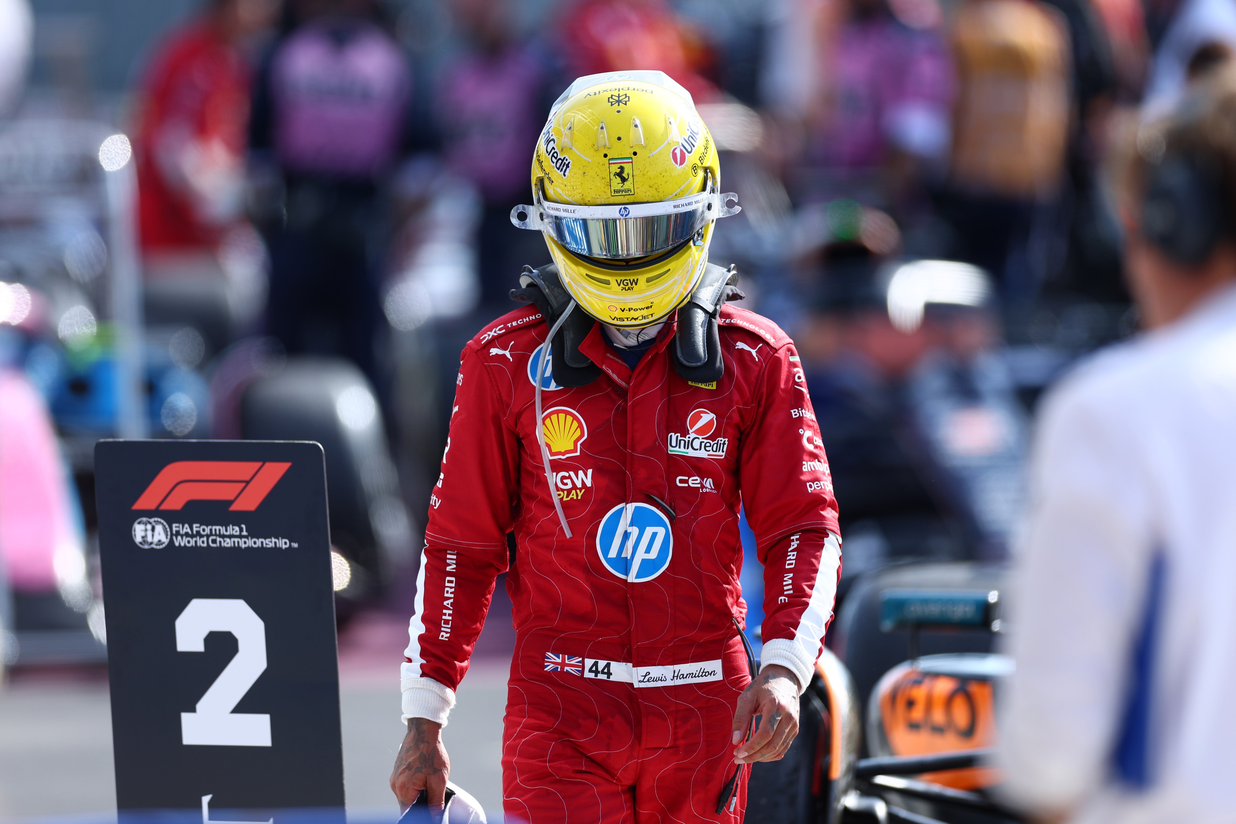 <p>Sixth placed Lewis Hamilton of Great Britain and Scuderia Ferrari in parc ferme during the F1 Grand Prix of Italy</p>