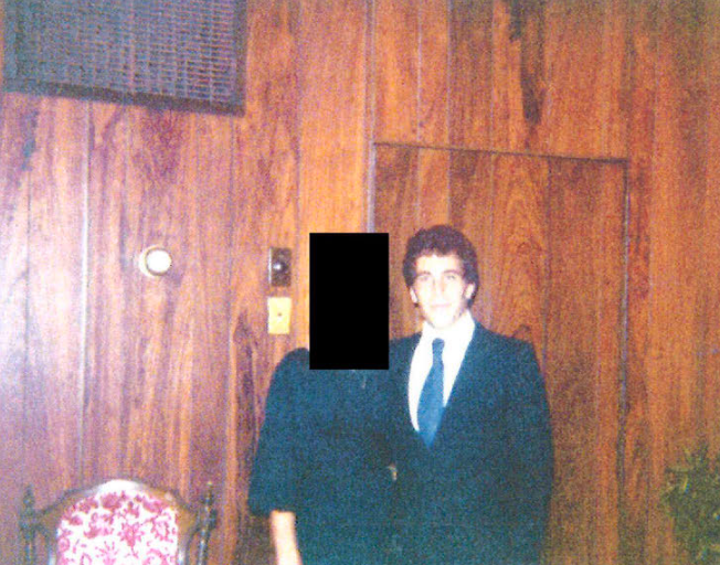 A young Jeffrey Epstein poses with a woman whose face has been blocked out to protect her privacy. The picture appears in the ‘girlfriends’ section of the birthday book